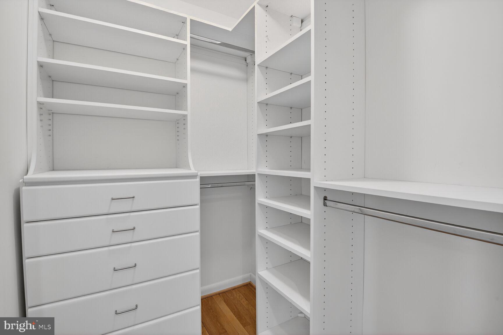 6104 Robinwood Road Bethesda, MD 20817 - Photo 23 of 45 a view of walk in closet with empty racks
