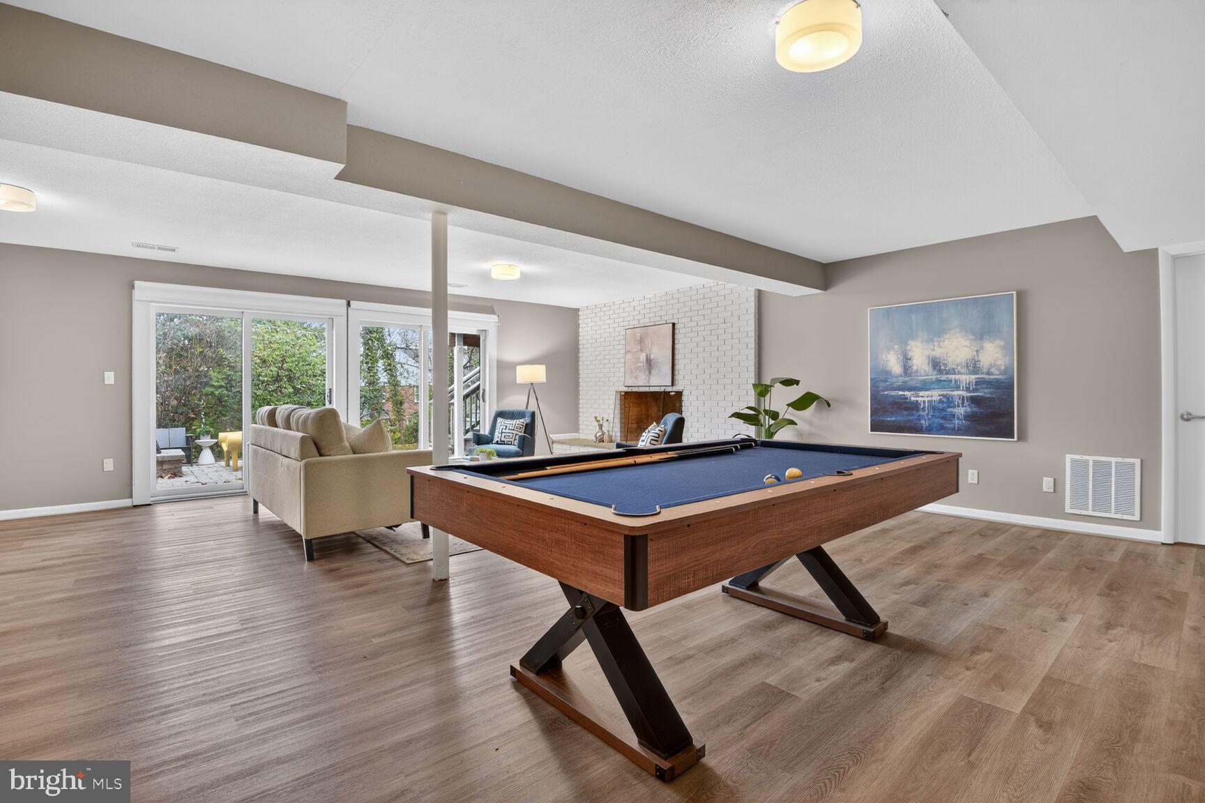 6104 Robinwood Road Bethesda, MD 20817 - Photo 26 of 45 a room with pool table and glass windows