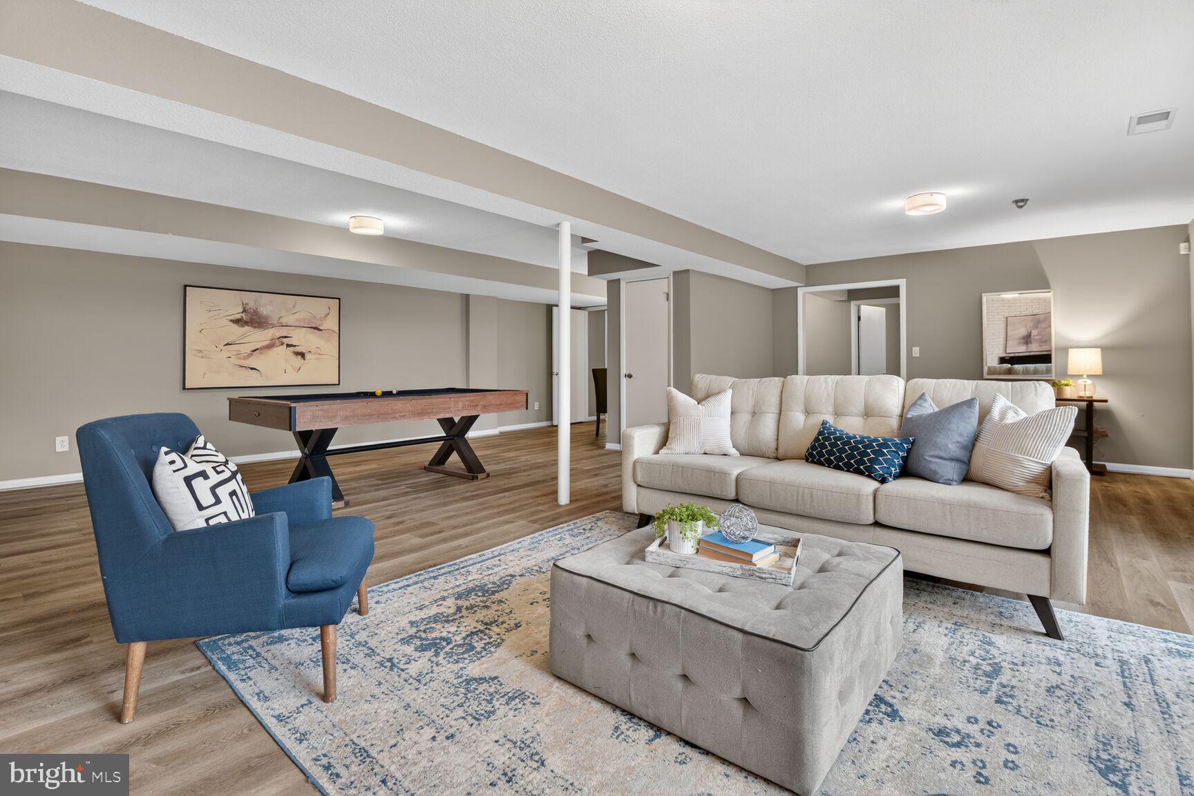 6104 Robinwood Road Bethesda, MD 20817 - Photo 31 of 45 a living room with furniture and view of kitchen