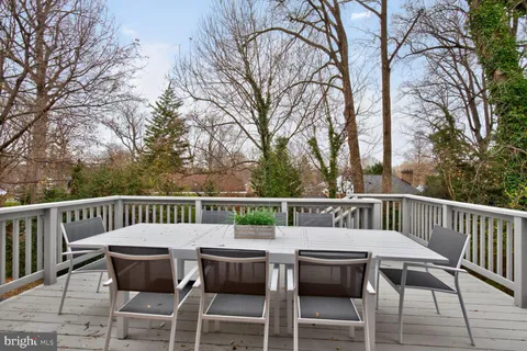 a view of a chairs and table on the deck