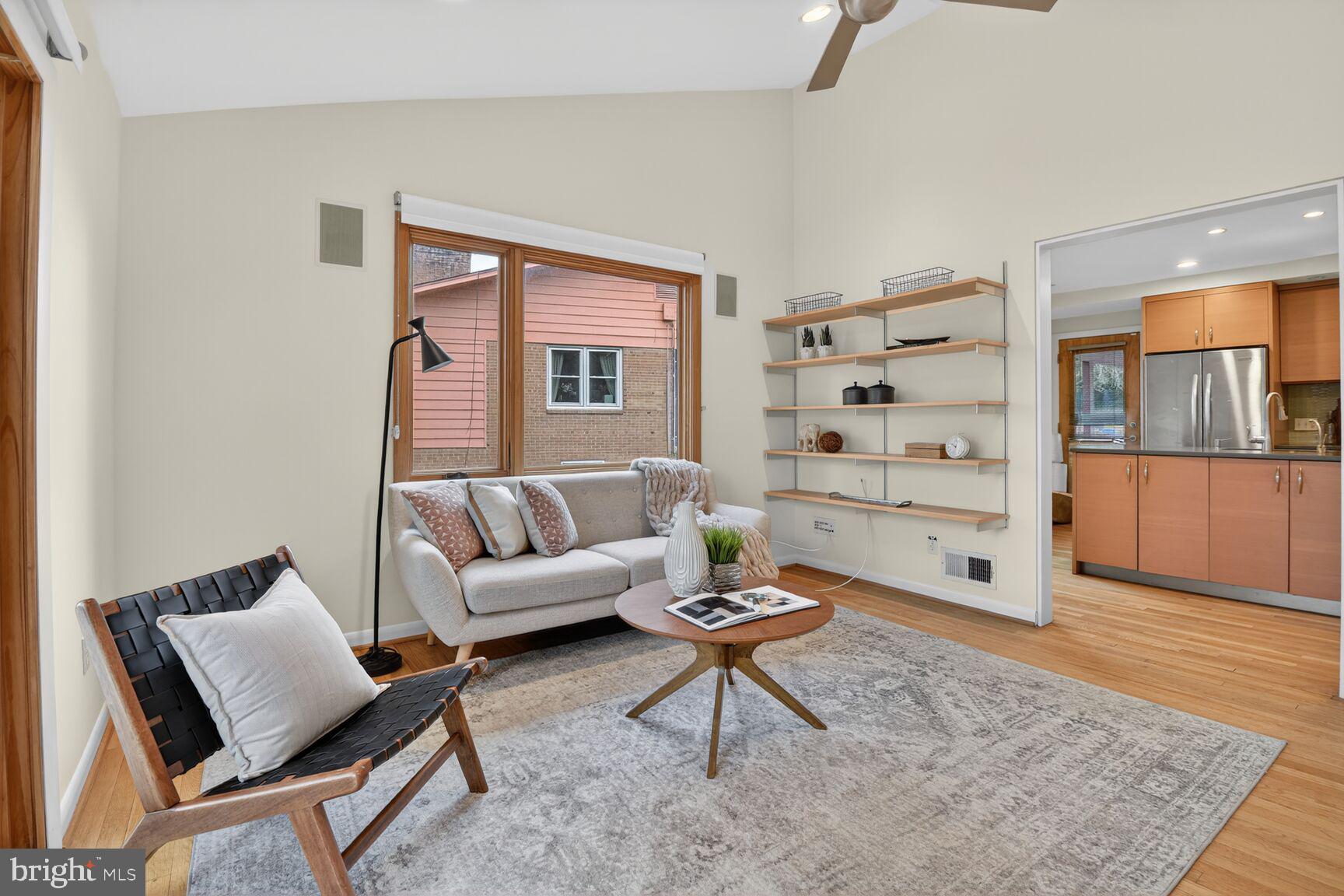 6104 Robinwood Road Bethesda, MD 20817 - Photo 8 of 45 a living room with furniture and a rug