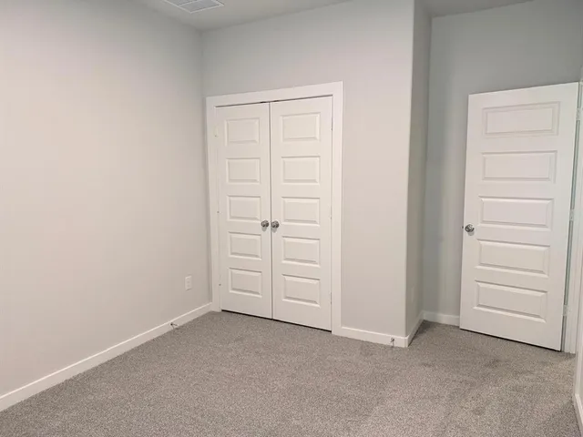 an empty room with closet