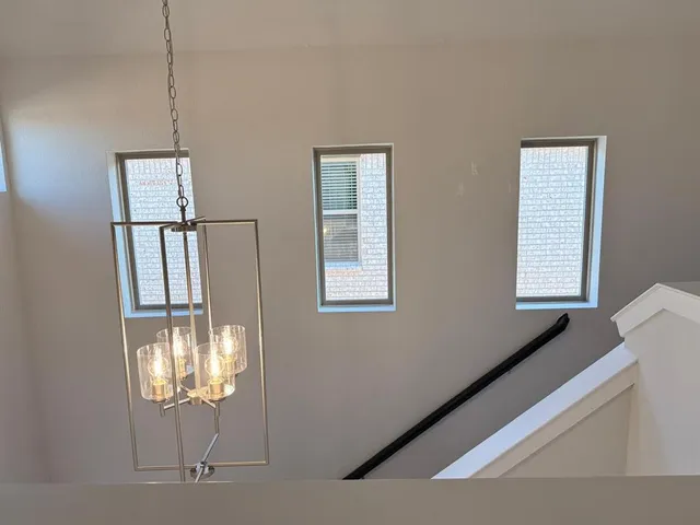 a view of empty room with windows