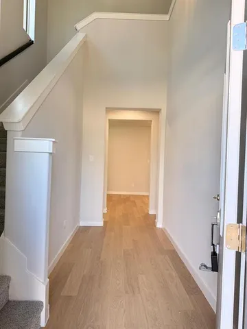 a white toilet sitting next to a white sink