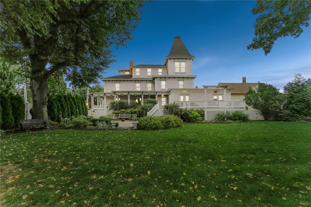 32 Broad Street Warren, RI 02885 - Photo 1 of 40 Evening side yard