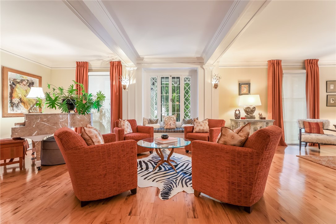 32 Broad Street Warren, RI 02885 - Photo 17 of 40 Formal living room with window seats and floor to ceiling windows/doors.