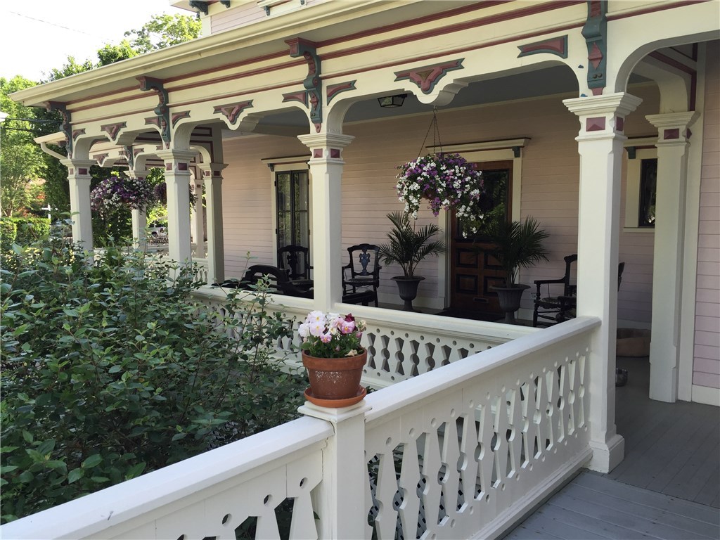 32 Broad Street Warren, RI 02885 - Photo 3 of 40 Decorative balusters, lintels and bracketed cornice details.