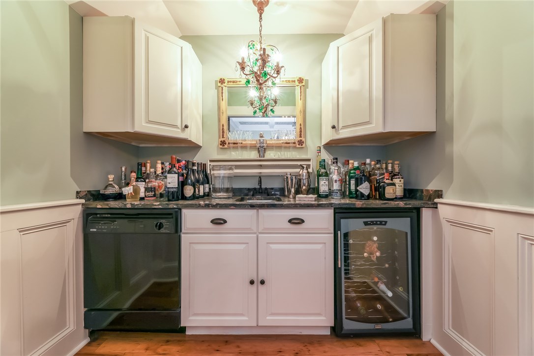 32 Broad Street Warren, RI 02885 - Photo 8 of 40 Wet bar with dishwasher and wine cooler.