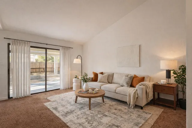 a view of an empty room with windows