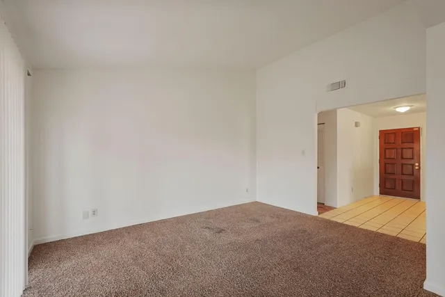 a bathroom with a sink toilet and a mirror