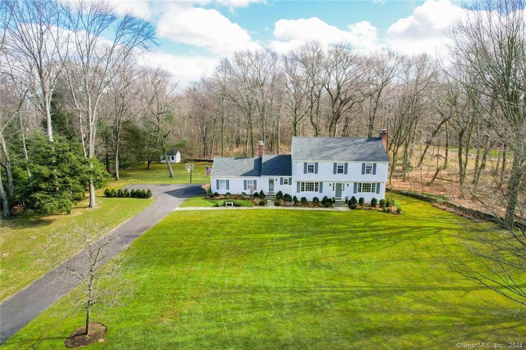 752 Towne House Road Fairfield, CT 06824 - Photo 1 of 1 A wooded backdrop, flanked by picturesque stone walls, frame this lovely location in lower Greenfield Hill.