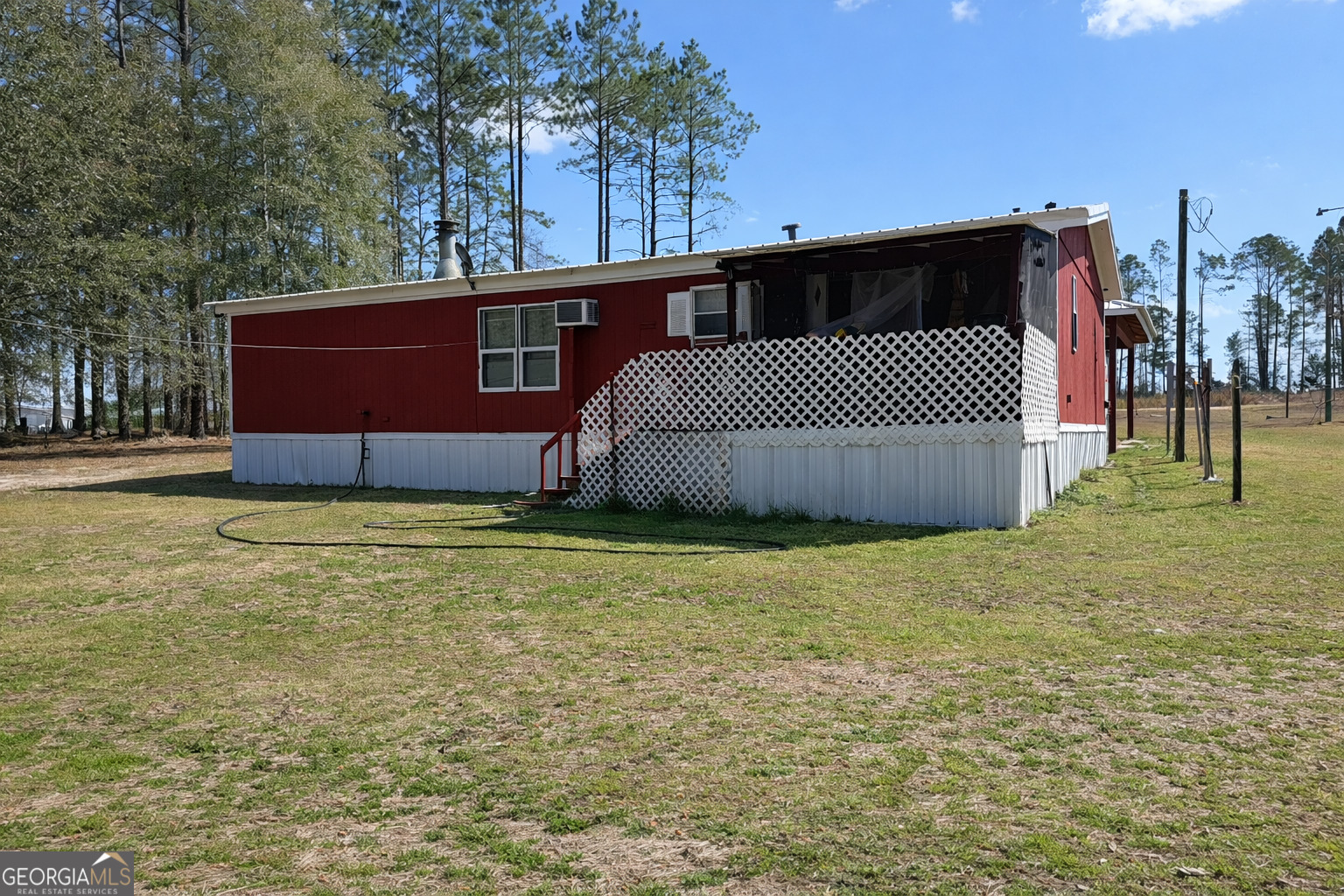 459 Louie Hightower Road Collins, GA 30421 - Photo 22 of 22 a view of a backyard