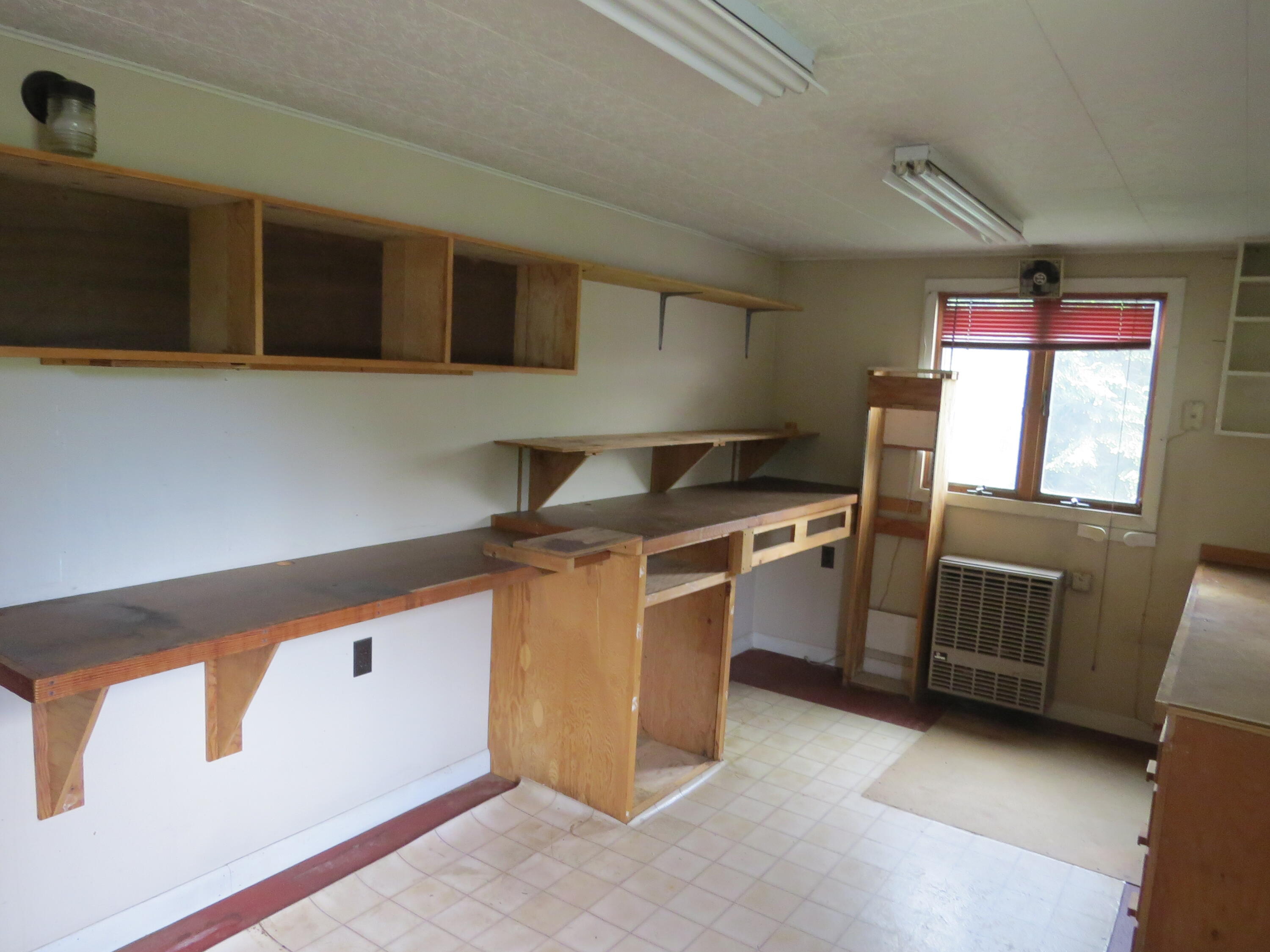 1338 Village Road Smithfield, ME 04978 - Photo 21 of 47 workshop in house