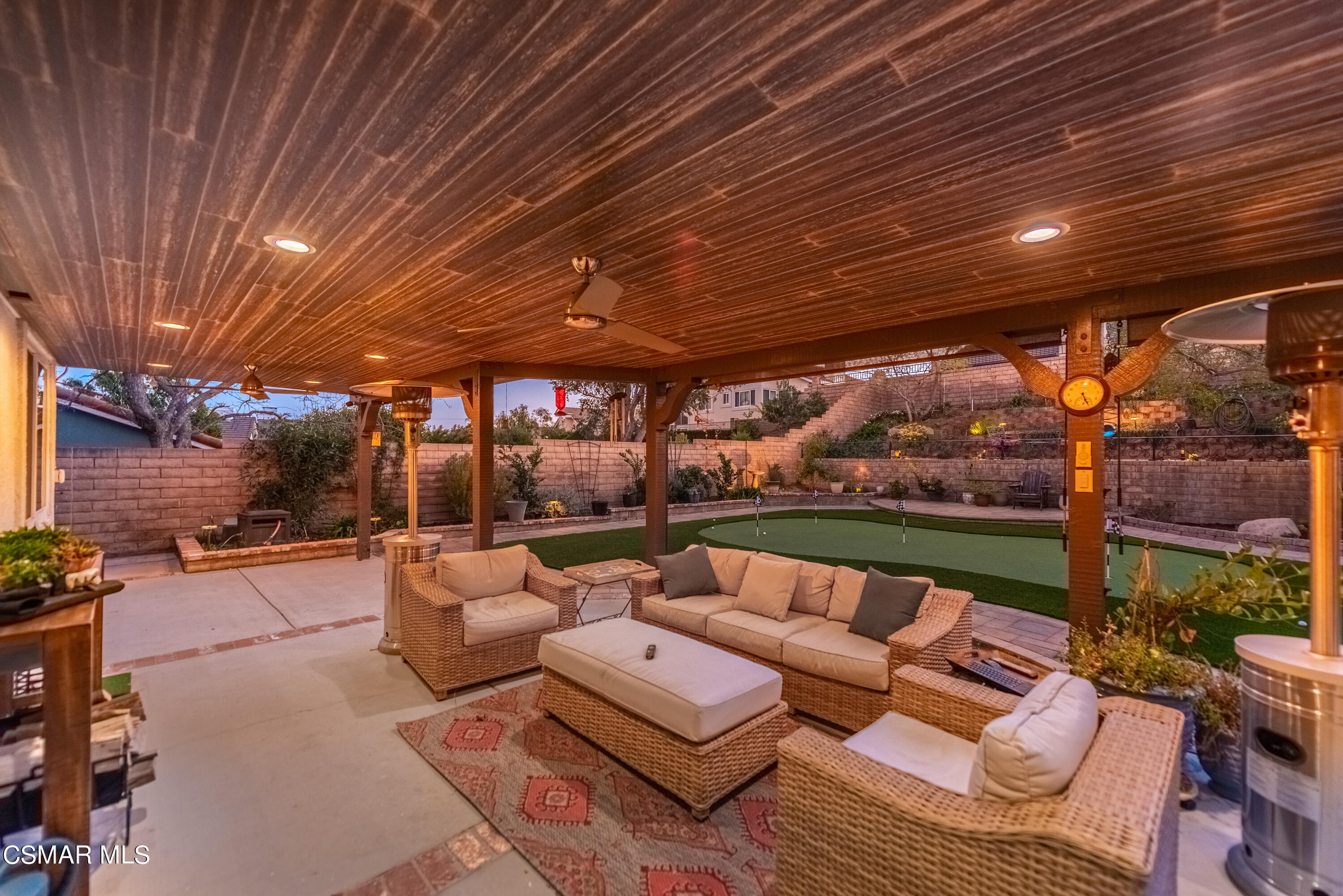 3233 Crazy Horse Drive Simi Valley, CA 93063 - Photo 14 of 65 a outdoor living space with patio furniture and a garden