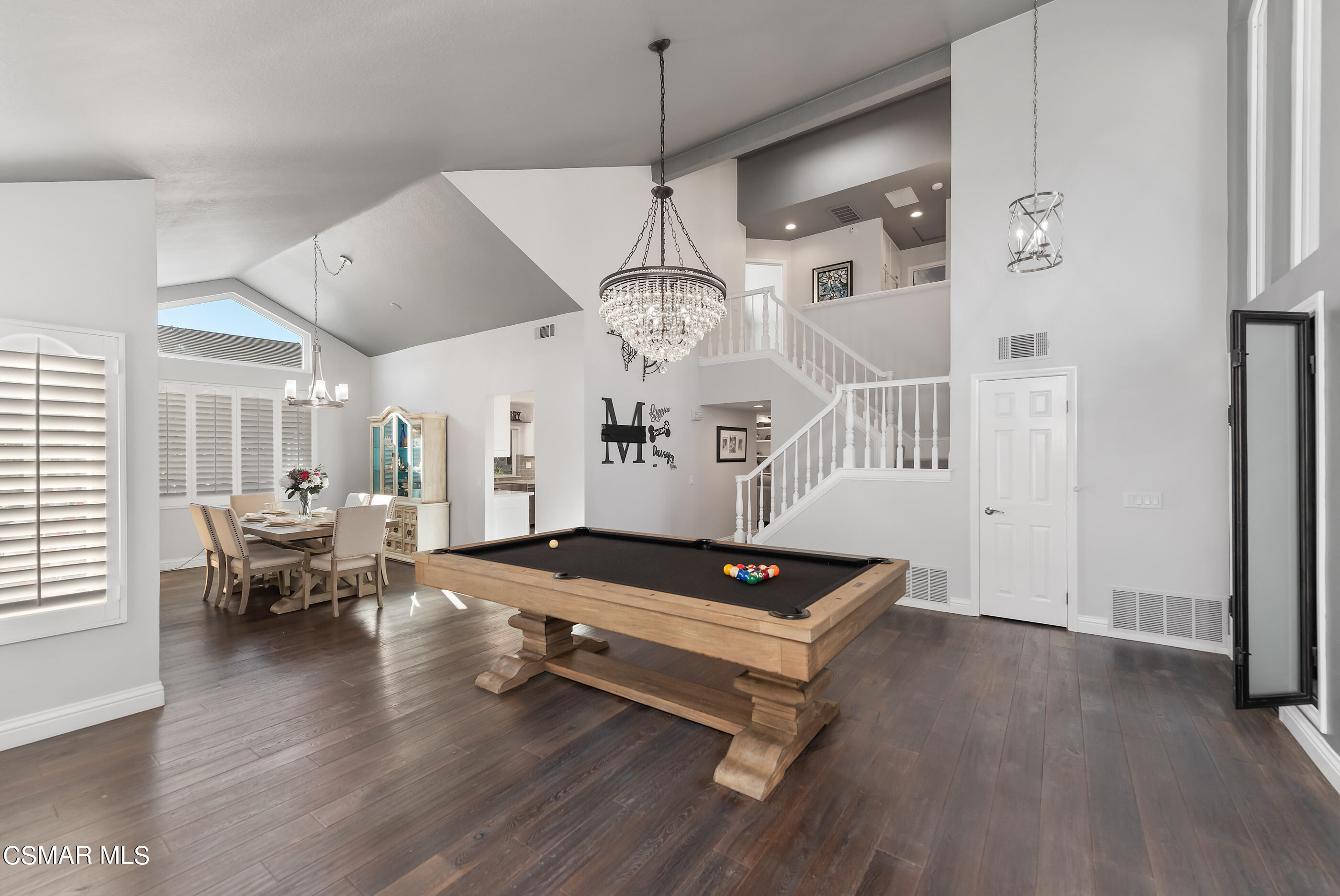 3233 Crazy Horse Drive Simi Valley, CA 93063 - Photo 18 of 65 a living room with furniture a window and wooden floor