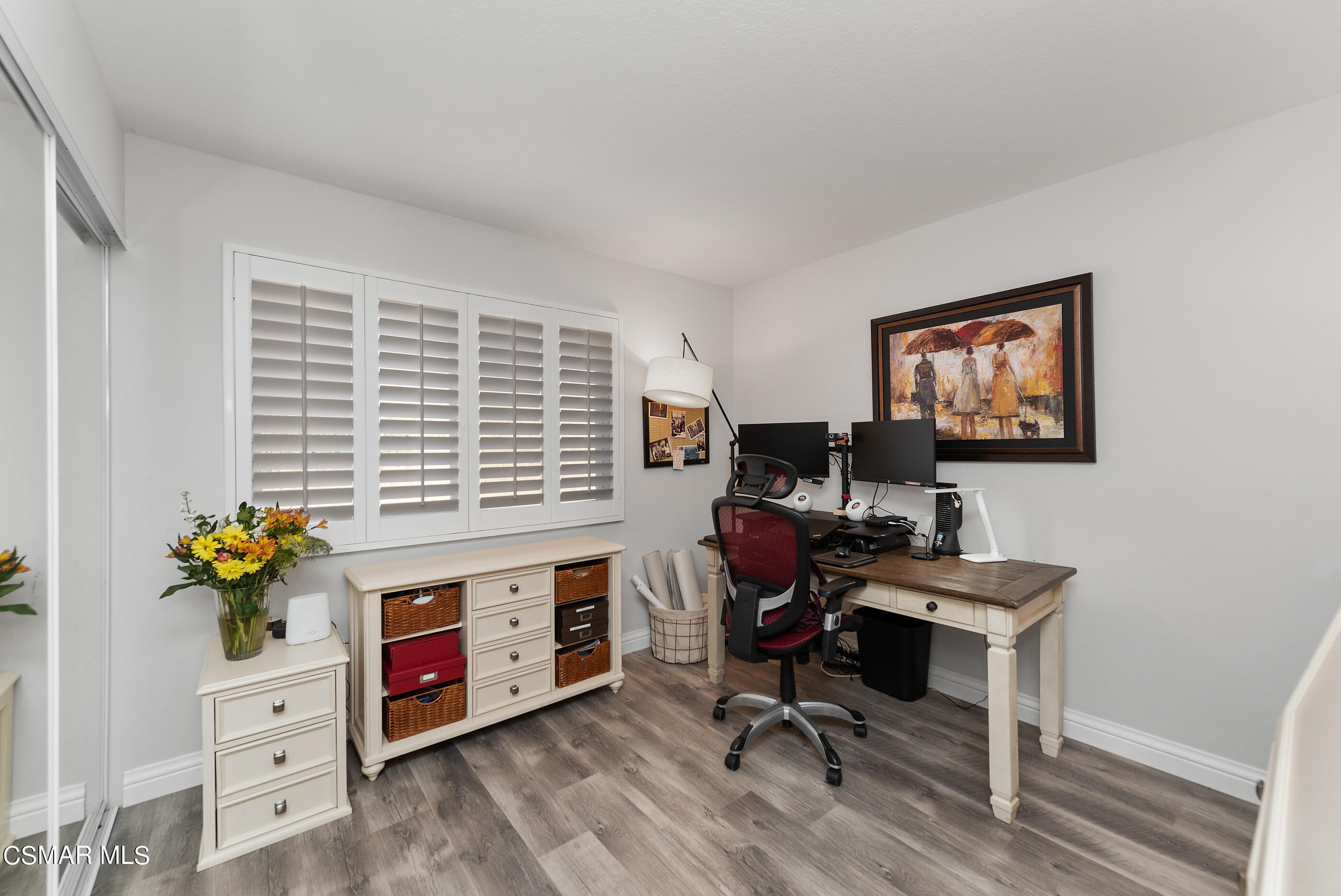 3233 Crazy Horse Drive Simi Valley, CA 93063 - Photo 30 of 65 a view of a workspace with furniture and a window