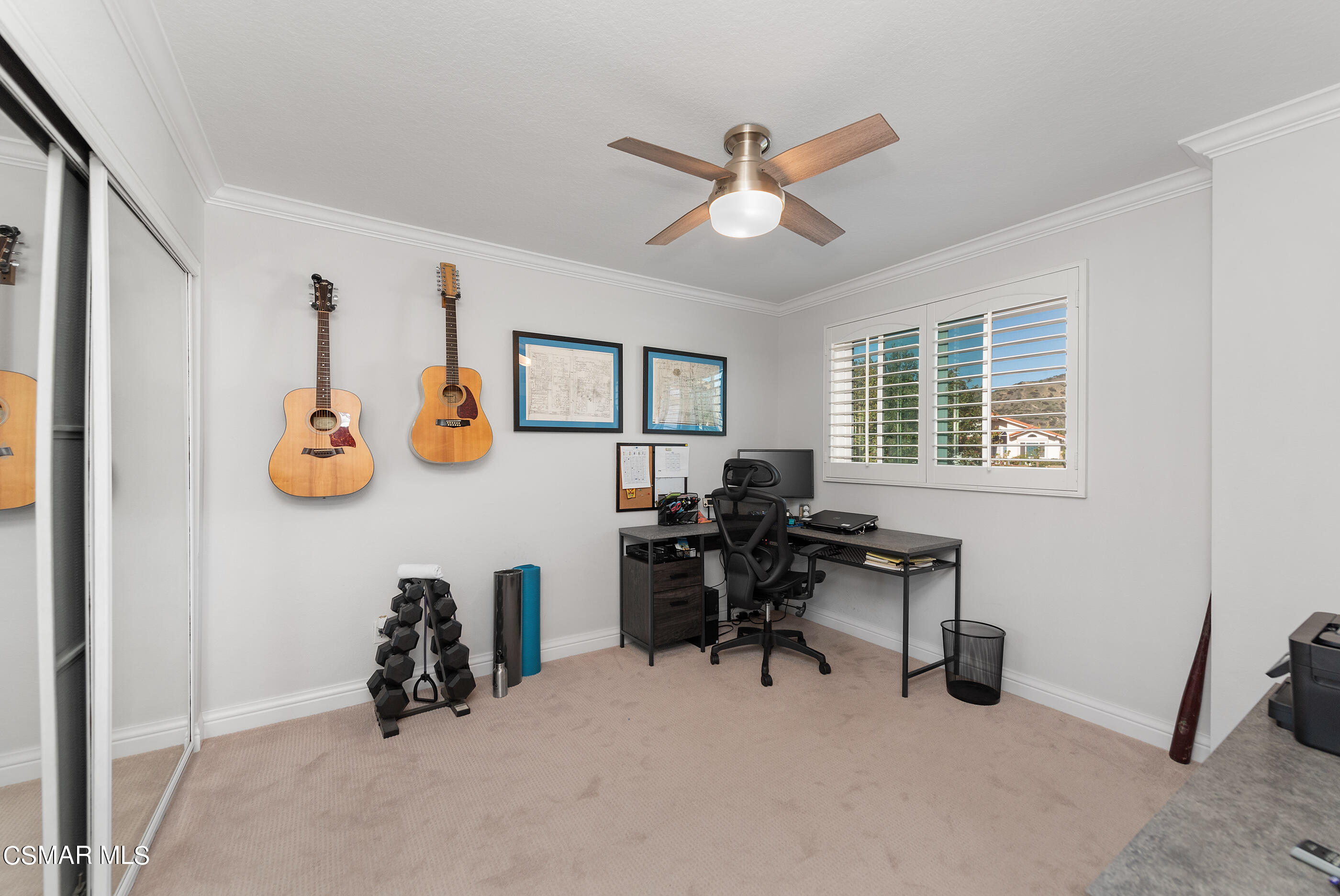 3233 Crazy Horse Drive Simi Valley, CA 93063 - Photo 36 of 65 a view of a workspace with furniture and a window
