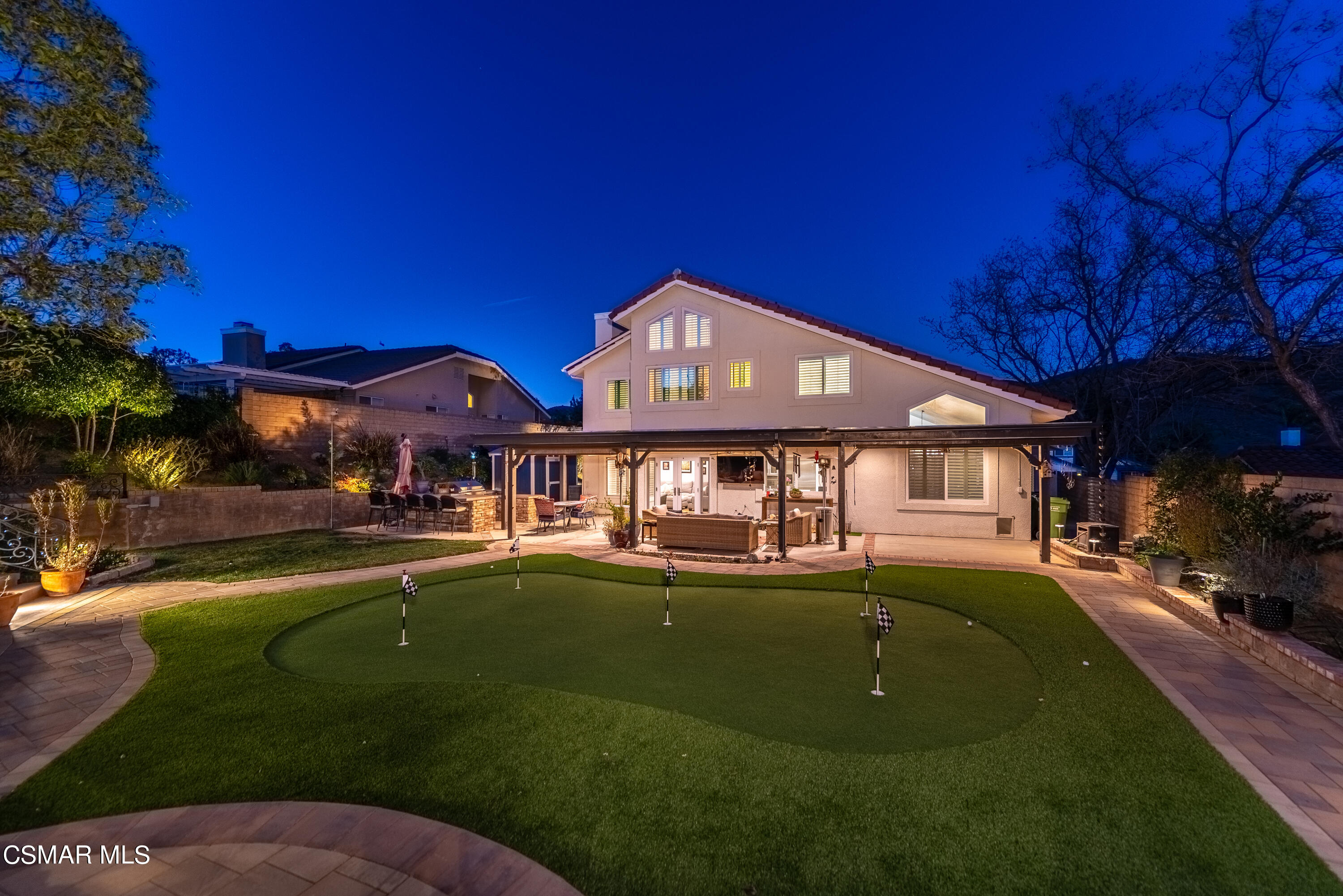 3233 Crazy Horse Drive Simi Valley, CA 93063 - Photo 4 of 65 a front view of a house with a garden