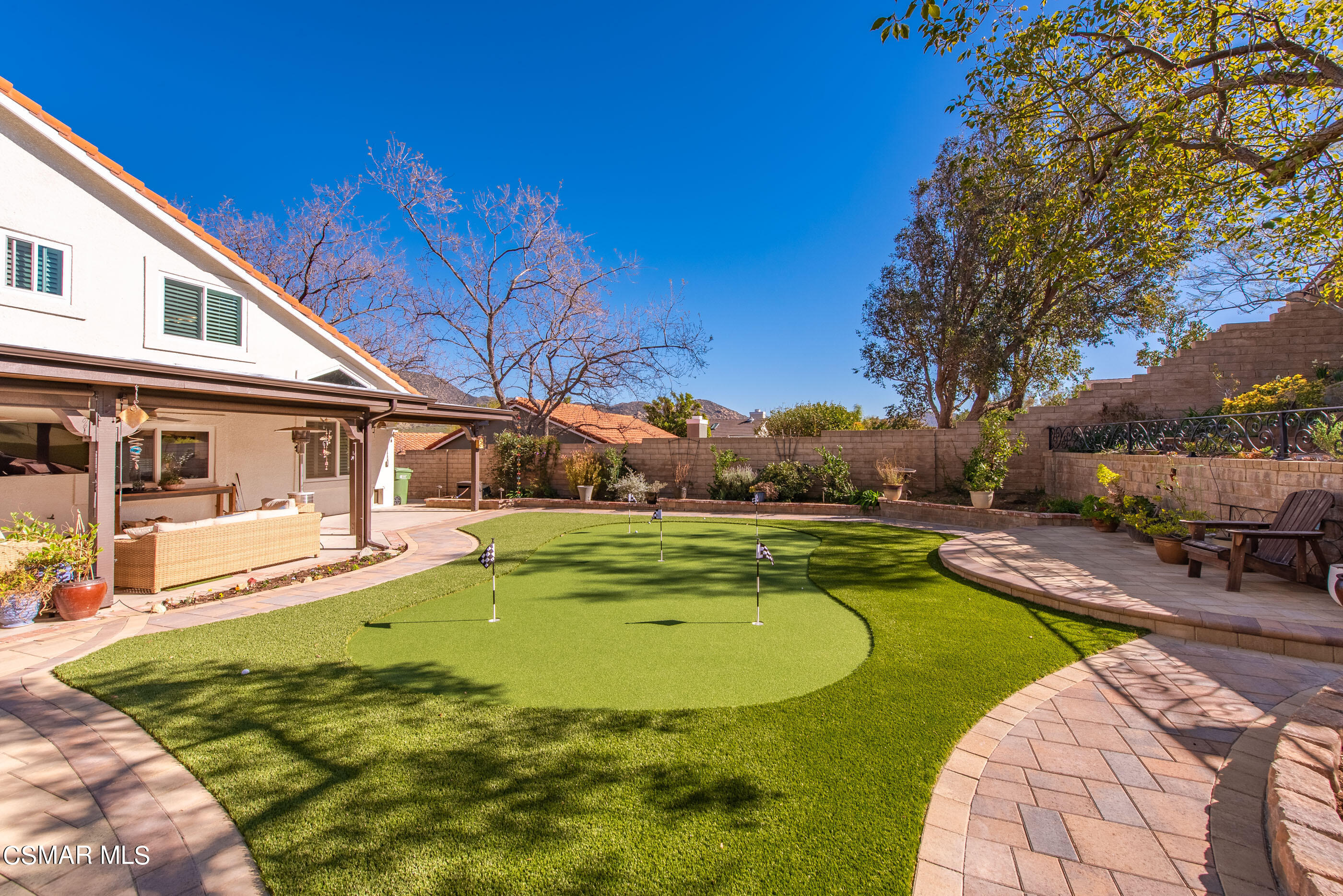 3233 Crazy Horse Drive Simi Valley, CA 93063 - Photo 48 of 65 a view of a house with swimming pool and sitting area