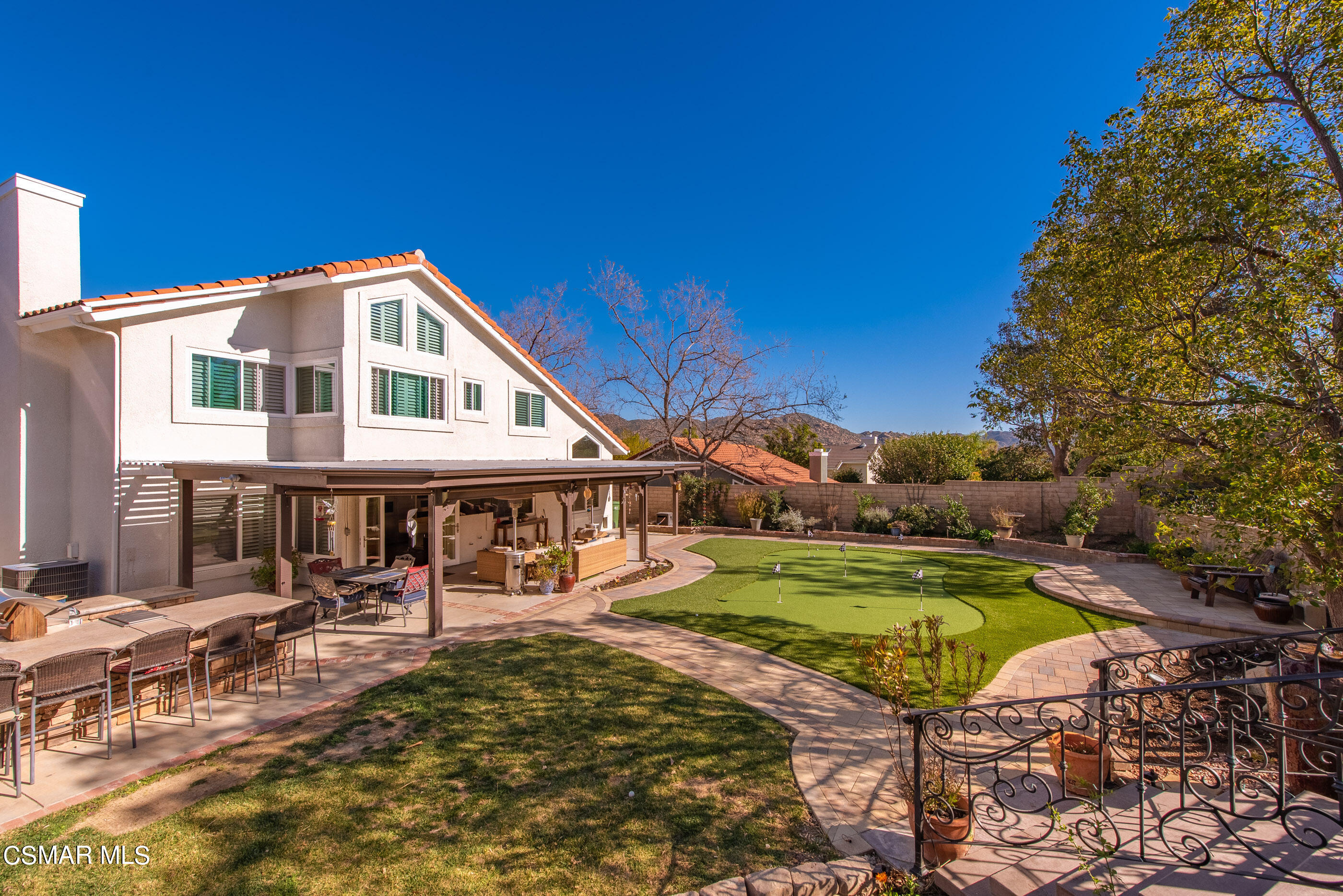 3233 Crazy Horse Drive Simi Valley, CA 93063 - Photo 53 of 65 a front view of a house with garden