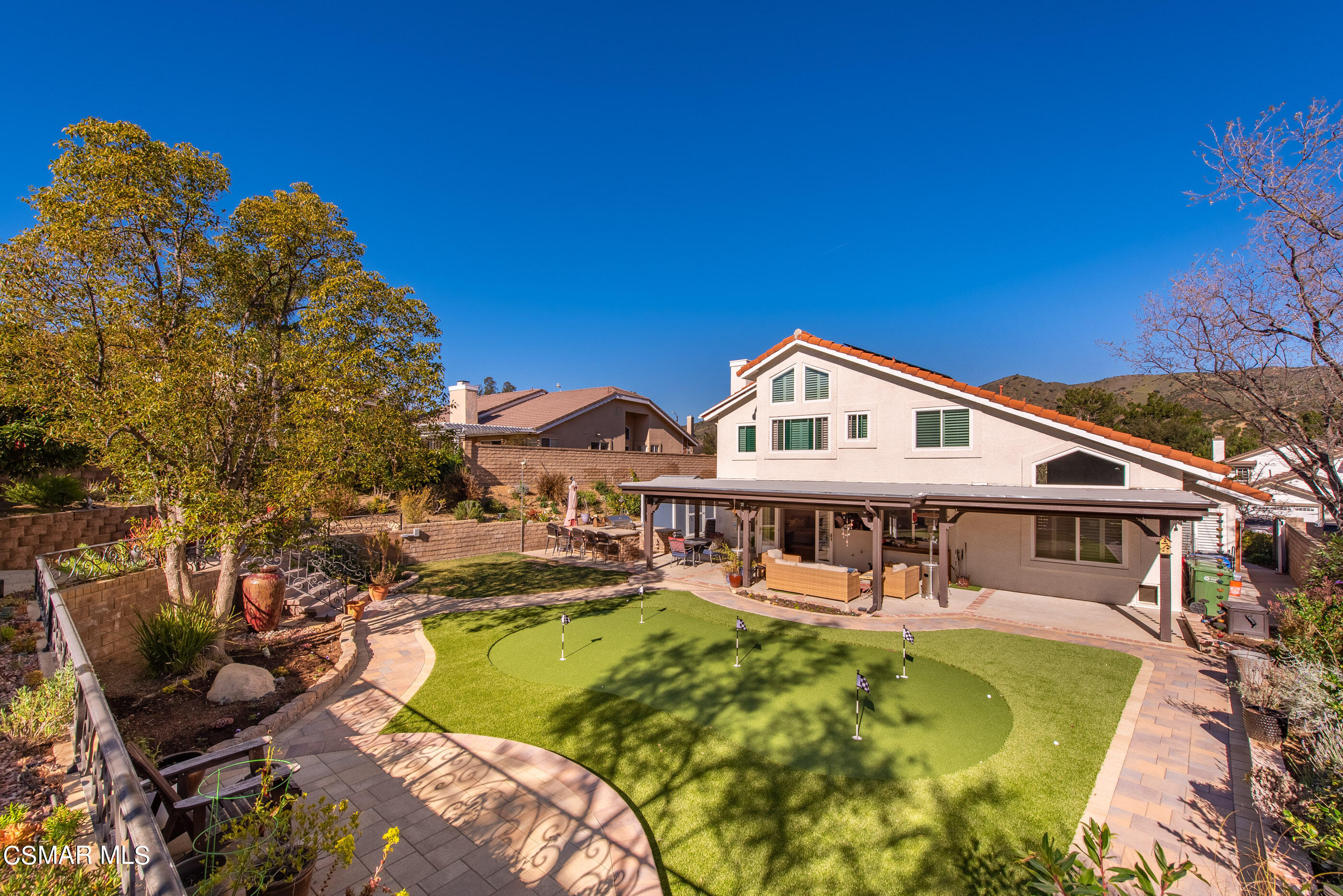 3233 Crazy Horse Drive Simi Valley, CA 93063 - Photo 54 of 65 a view of a house with pool and chairs