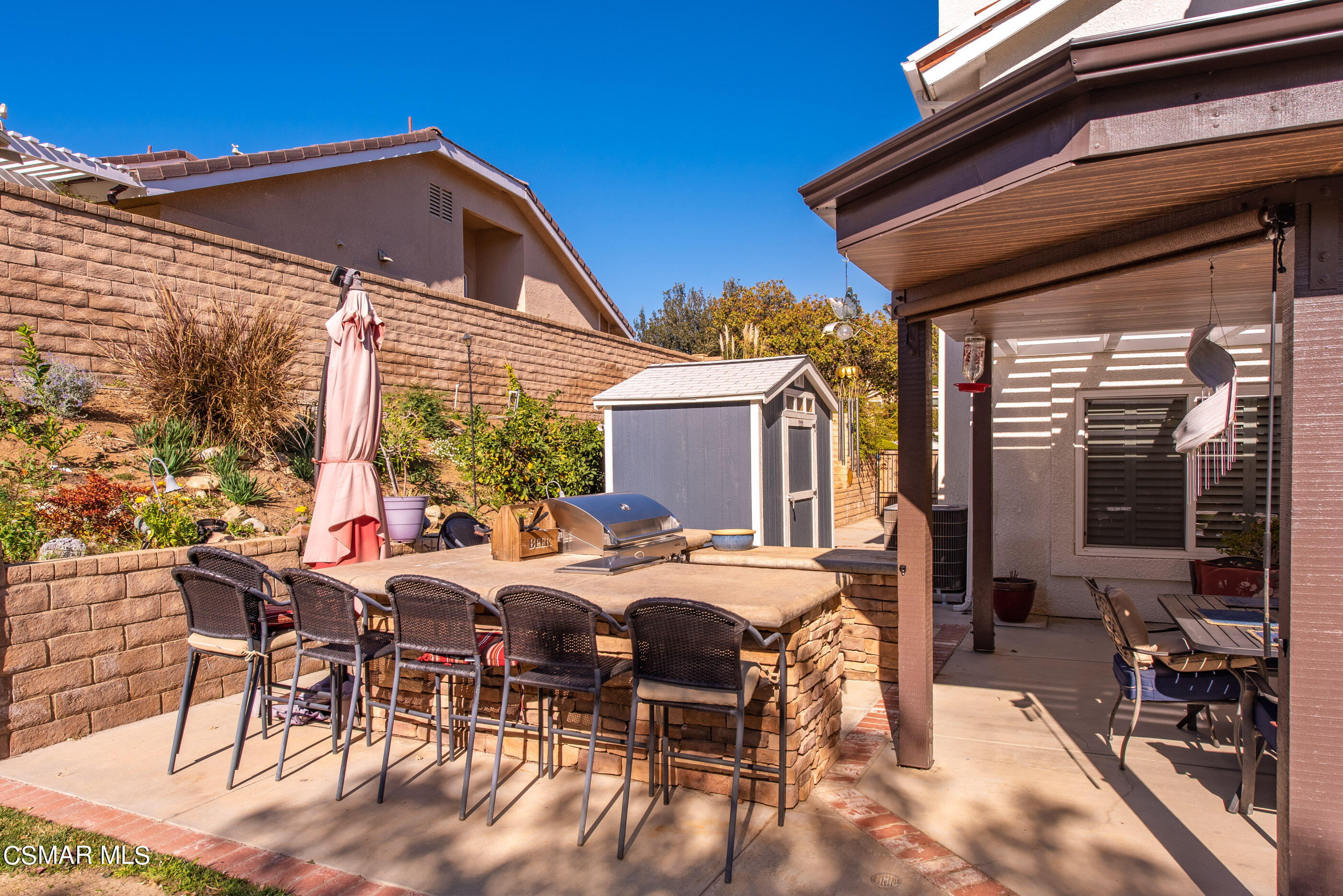 3233 Crazy Horse Drive Simi Valley, CA 93063 - Photo 56 of 65 a view of a house with backyard and sitting area
