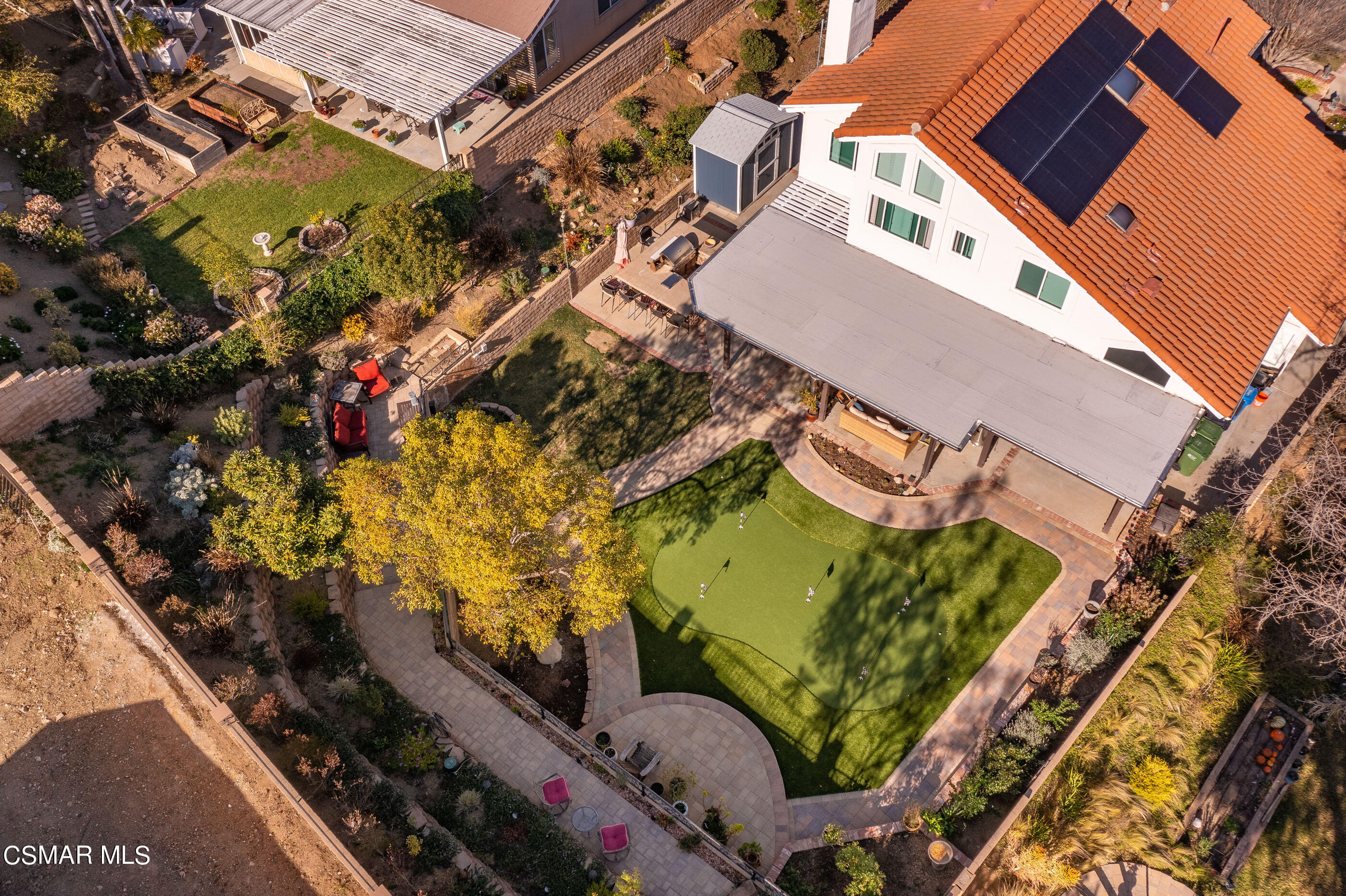 3233 Crazy Horse Drive Simi Valley, CA 93063 - Photo 63 of 65 an aerial view of a house with a yard and outdoor seating