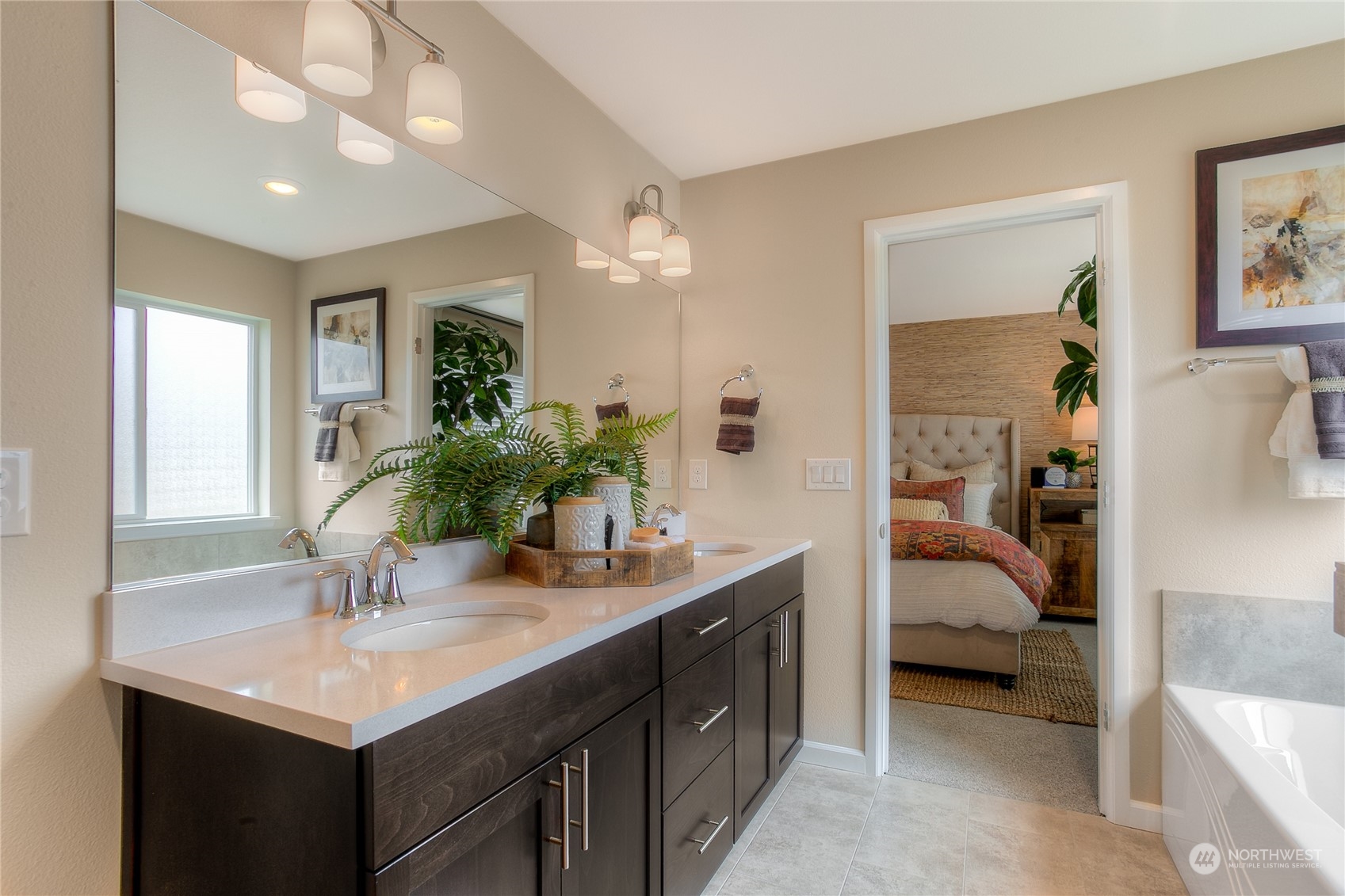 20828 42nd Drive Southeast, Unit 145 Bothell, WA 98021 - Photo 12 of 15 a en suite bathroom with a sink and a mirror
