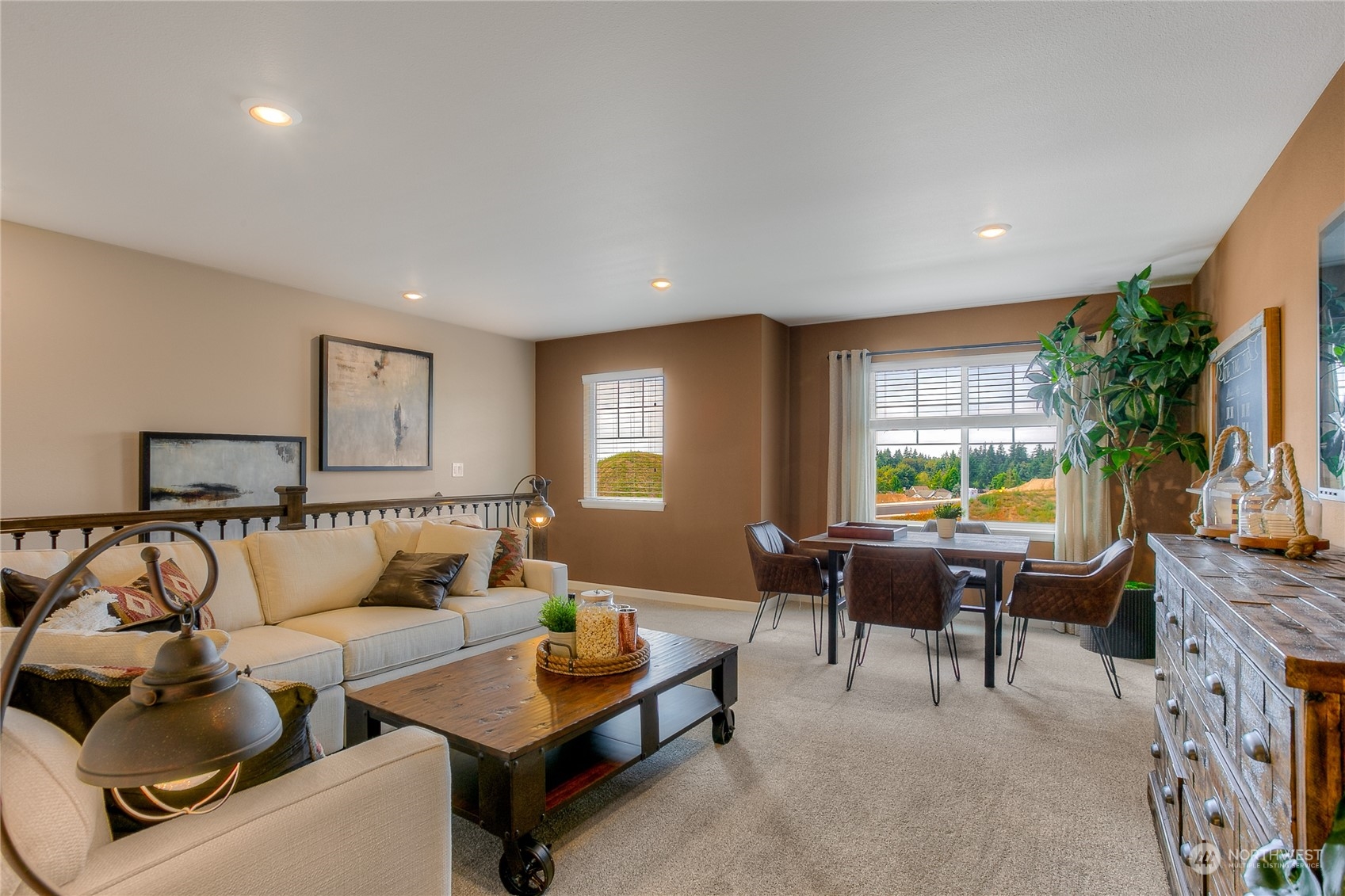 20828 42nd Drive Southeast, Unit 145 Bothell, WA 98021 - Photo 9 of 15 a living room with furniture and a flat screen tv