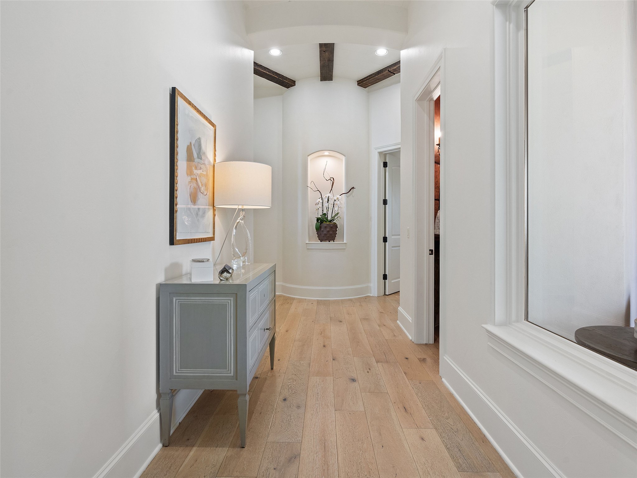11620 Musket Rim Street Austin, TX 78738 - Photo 16 of 32 wooden floor in a gallery with a mirror