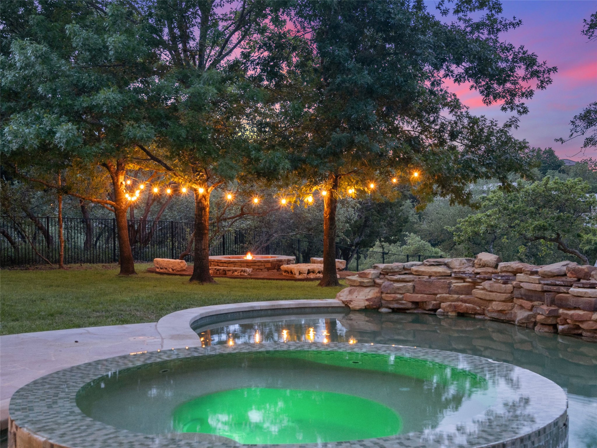 11620 Musket Rim Street Austin, TX 78738 - Photo 22 of 32 a view of a swimming pool with an outdoor space and seating area