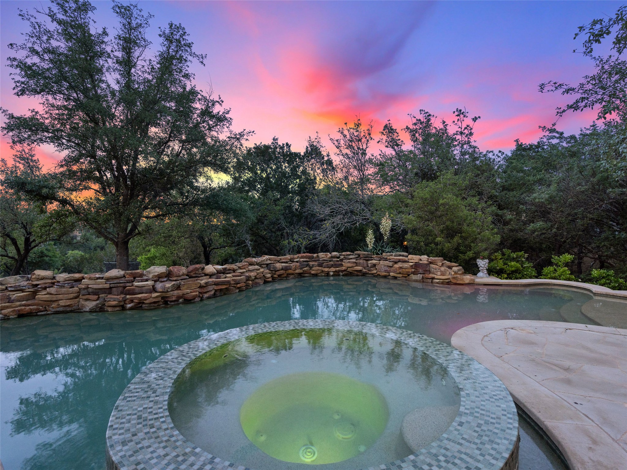 11620 Musket Rim Street Austin, TX 78738 - Photo 26 of 32 a view of a swimming pool with a yard