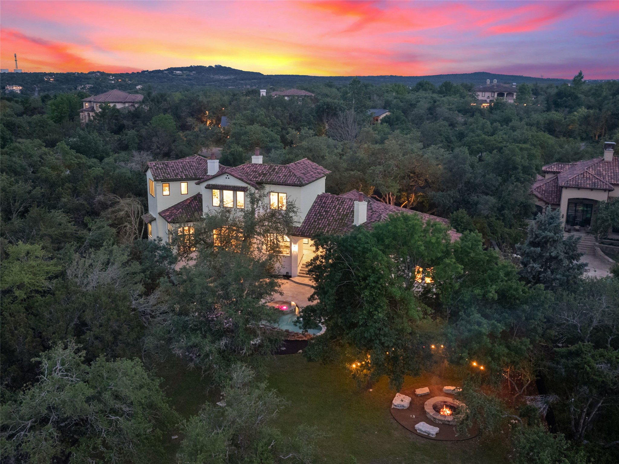 11620 Musket Rim Street Austin, TX 78738 - Photo 27 of 32 a view of a town with mountains in the background