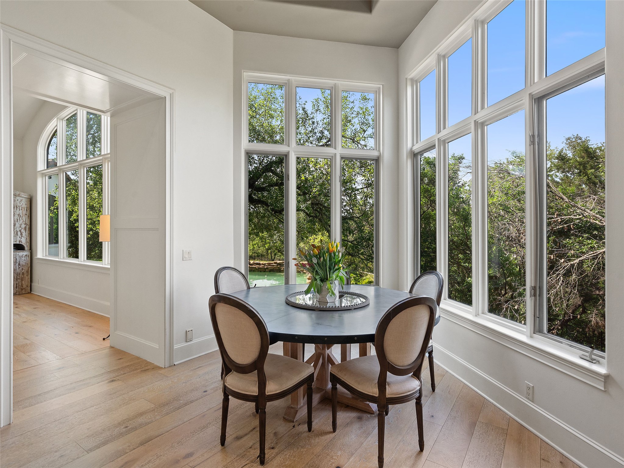 11620 Musket Rim Street Austin, TX 78738 - Photo 4 of 32 a dining room with furniture window wooden floor