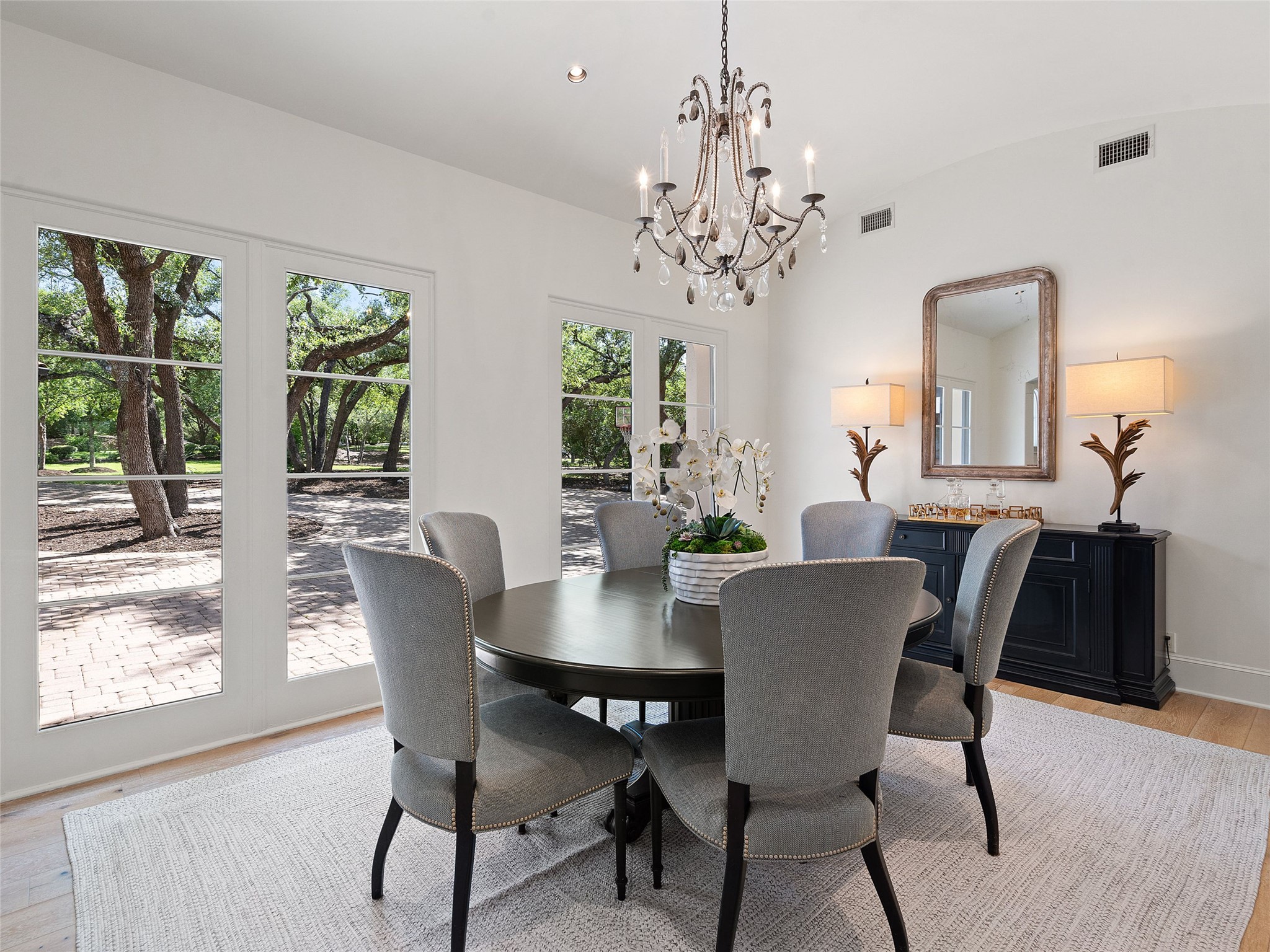 11620 Musket Rim Street Austin, TX 78738 - Photo 6 of 32 a view of a dining room with furniture window and outside view