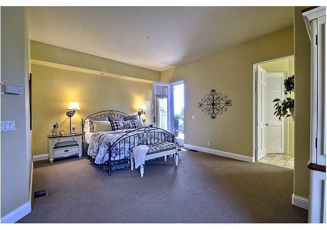 1035 Sleeping Indian Road Oceanside, CA 92057 - Photo 11 of 25 Spacious Master Suite and retreat with warm colors and french door leading to side patio