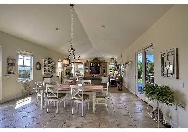 1035 Sleeping Indian Road Oceanside, CA 92057 - Photo 7 of 25 The permitted remodel added a great room onto the spacious kitchen which is definately the heart of the home.