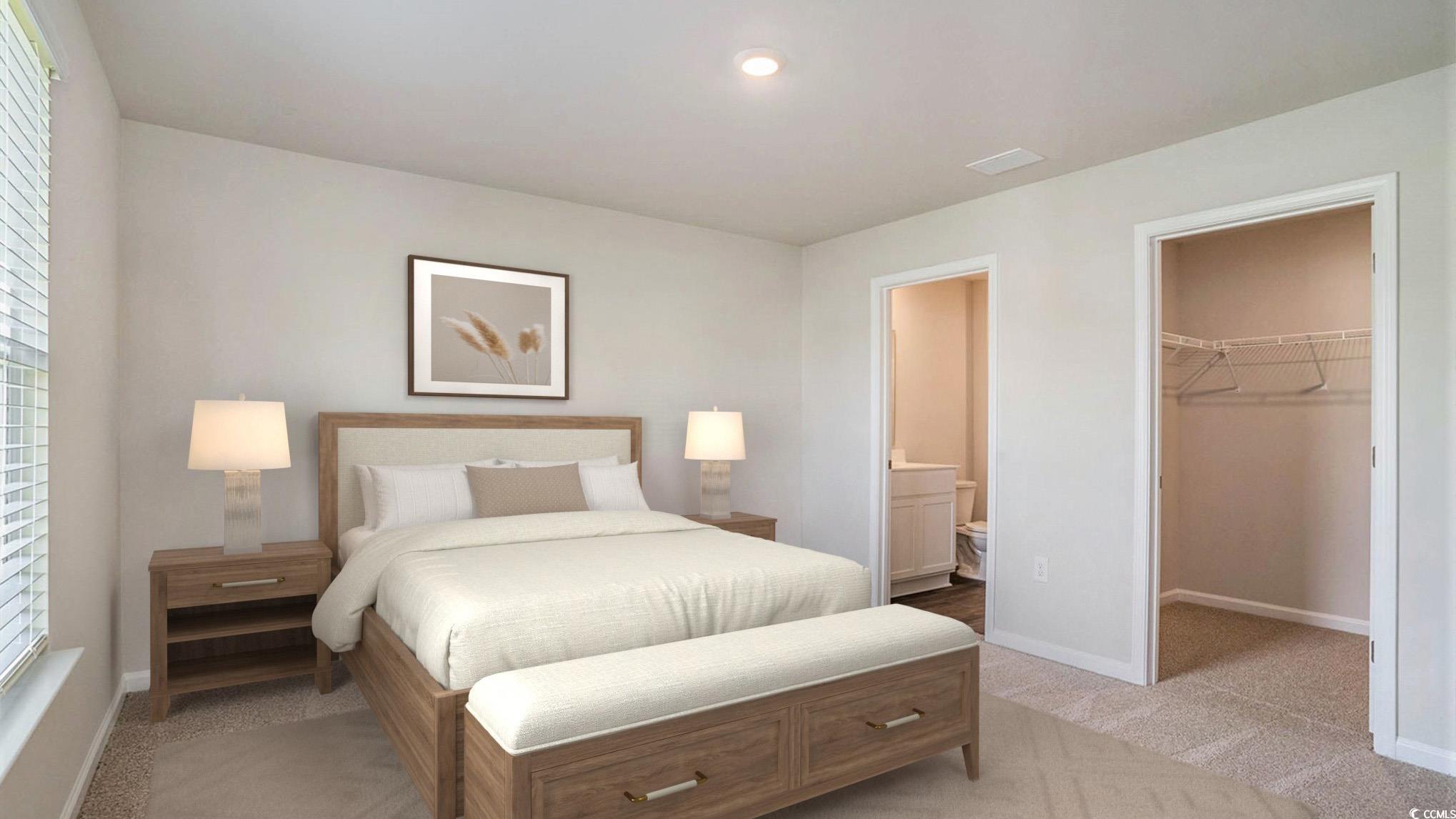 7463 Meadow Walk Loop Loris, SC 29569 - Photo 5 of 13 Virtually staged Bedroom featuring a spacious closet, light carpet, a closet, and ensuite bath