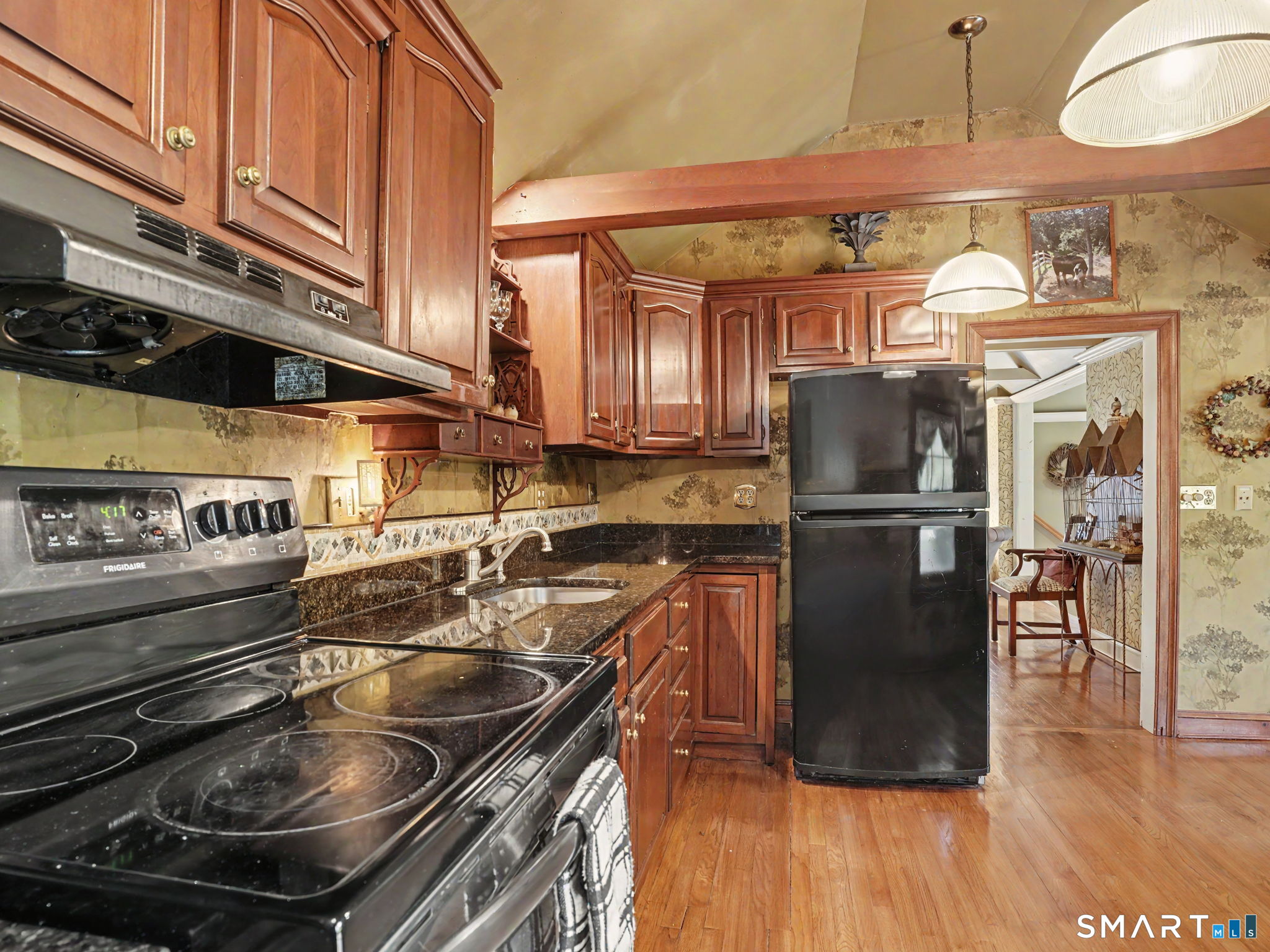 42 Cannondale Road Weston, CT 06883 - Photo 11 of 31 a kitchen with a stove a refrigerator and a microwave