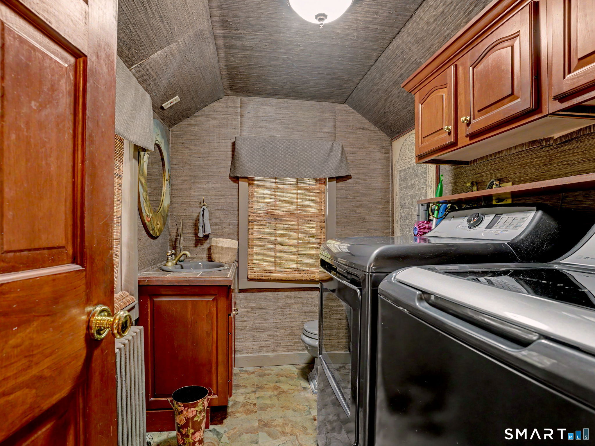 42 Cannondale Road Weston, CT 06883 - Photo 13 of 31 a utility room with closet dryer and washer