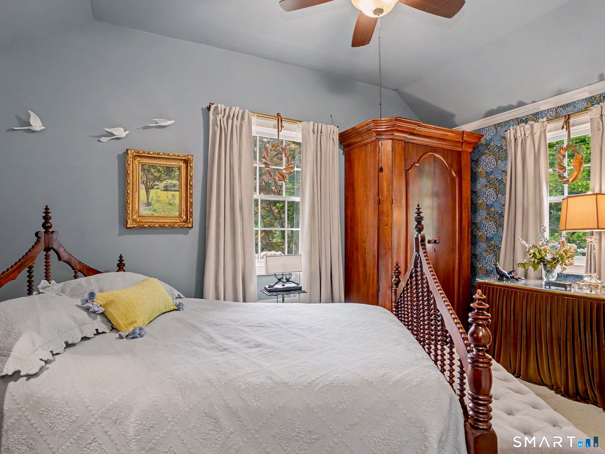 42 Cannondale Road Weston, CT 06883 - Photo 15 of 31 a bedroom with a bed and wooden floor