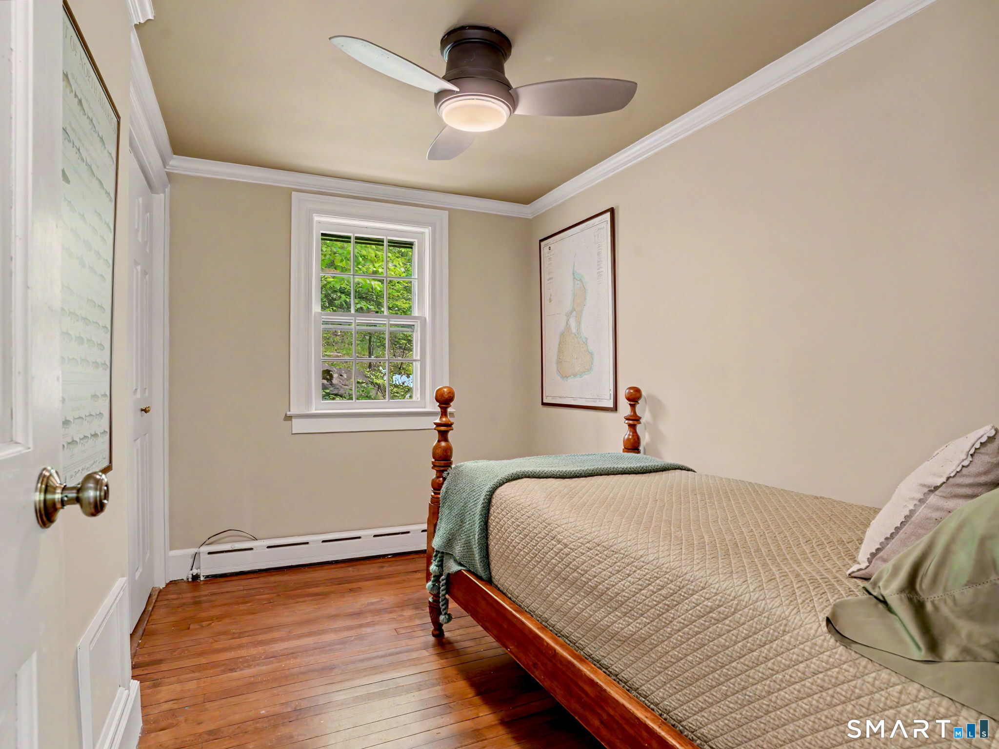 42 Cannondale Road Weston, CT 06883 - Photo 16 of 31 a bedroom with a bed and a window