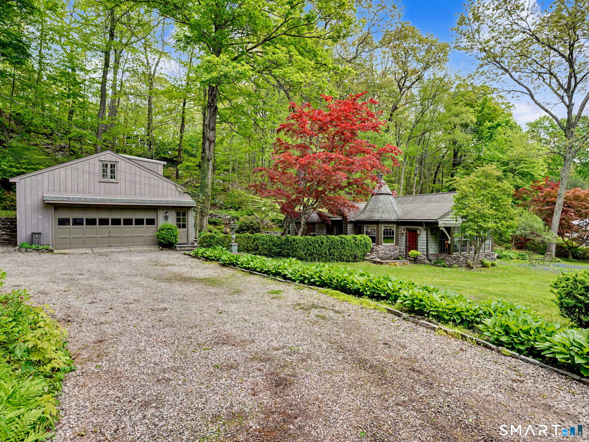 42 Cannondale Road Weston, CT 06883 - Photo 21 of 31 a view of a house with a yard and tree s