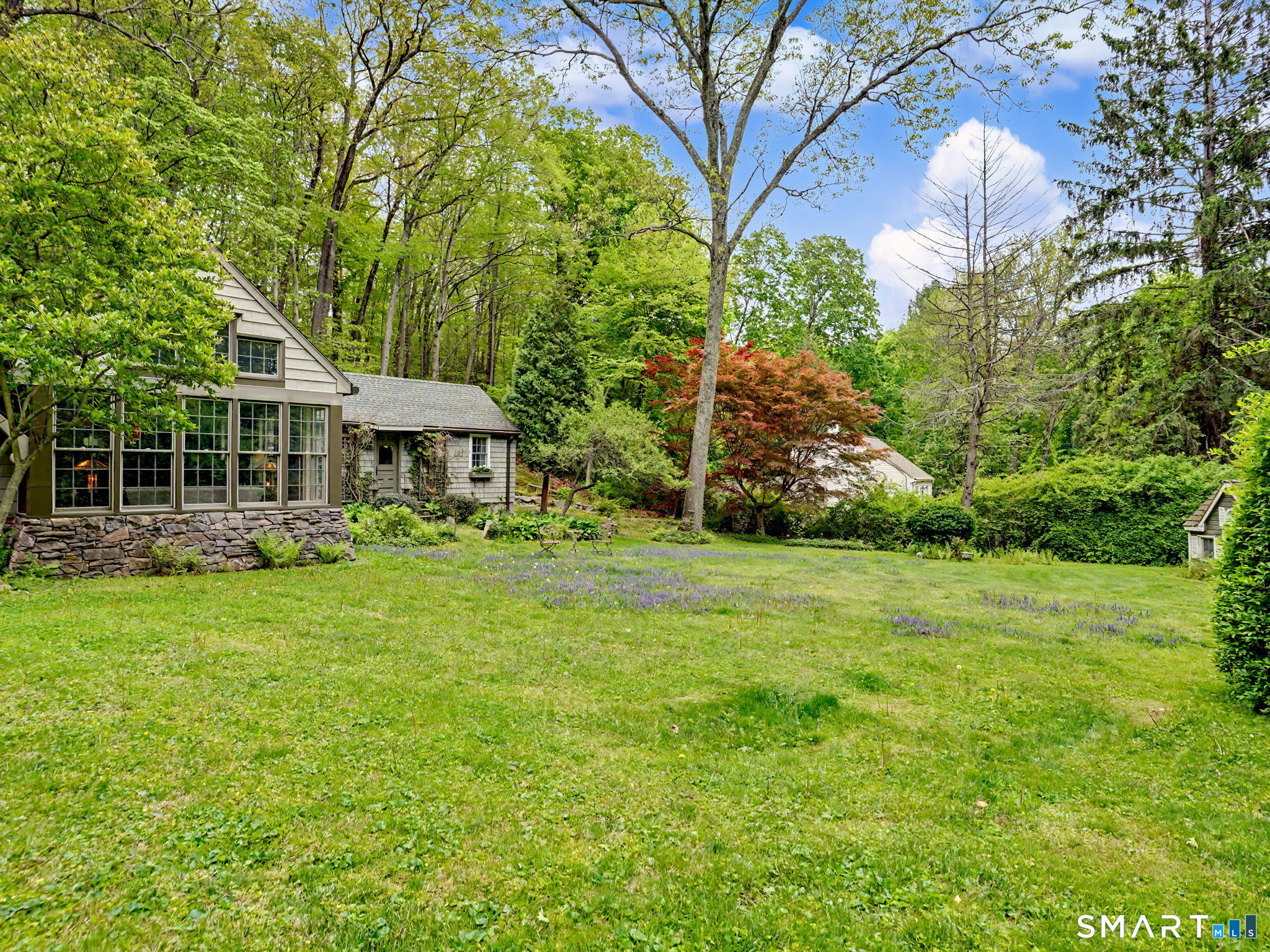 42 Cannondale Road Weston, CT 06883 - Photo 26 of 31 a front view of a house with garden