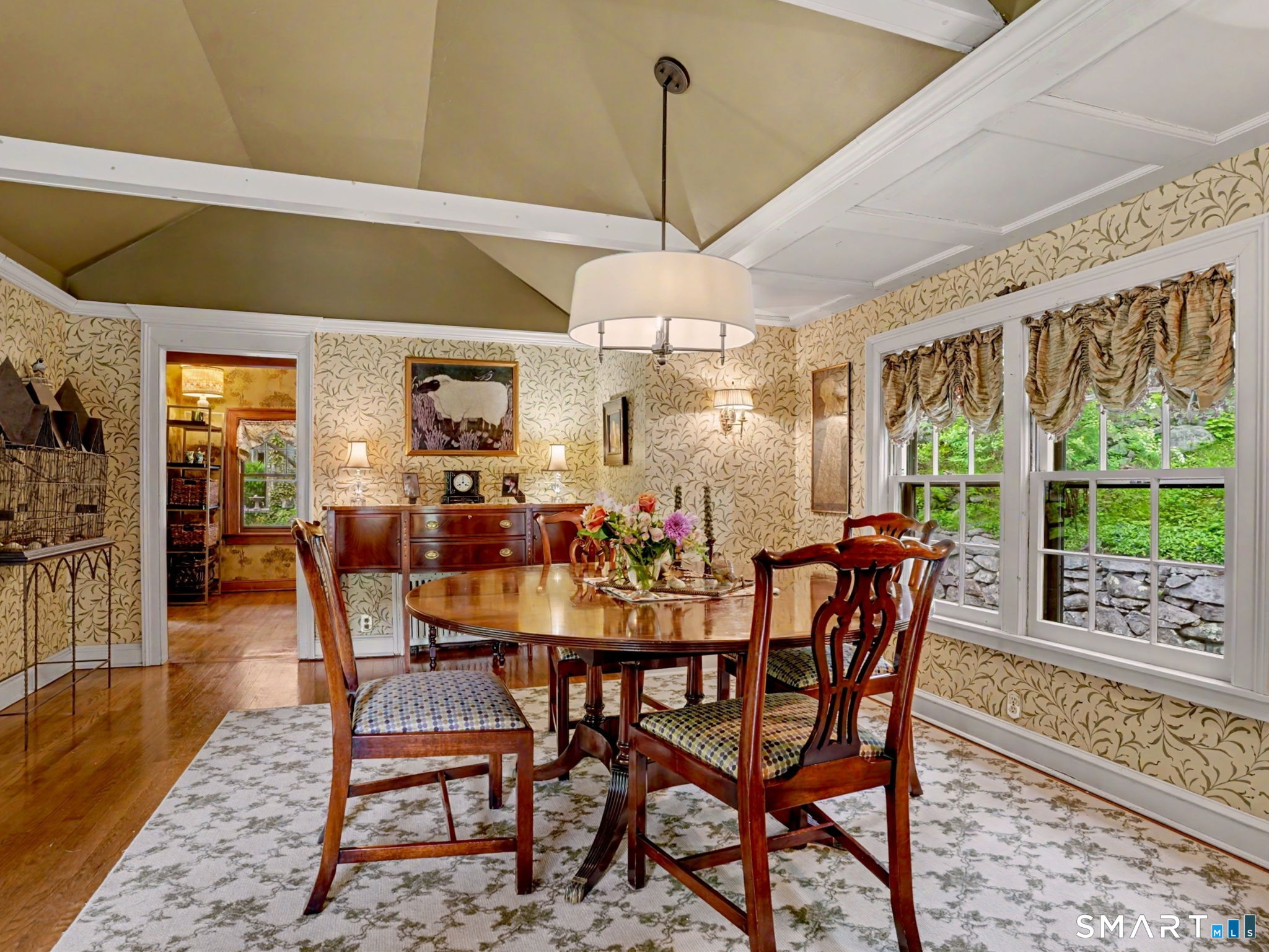 42 Cannondale Road Weston, CT 06883 - Photo 9 of 31 a view of a dining room with furniture window and wooden floor