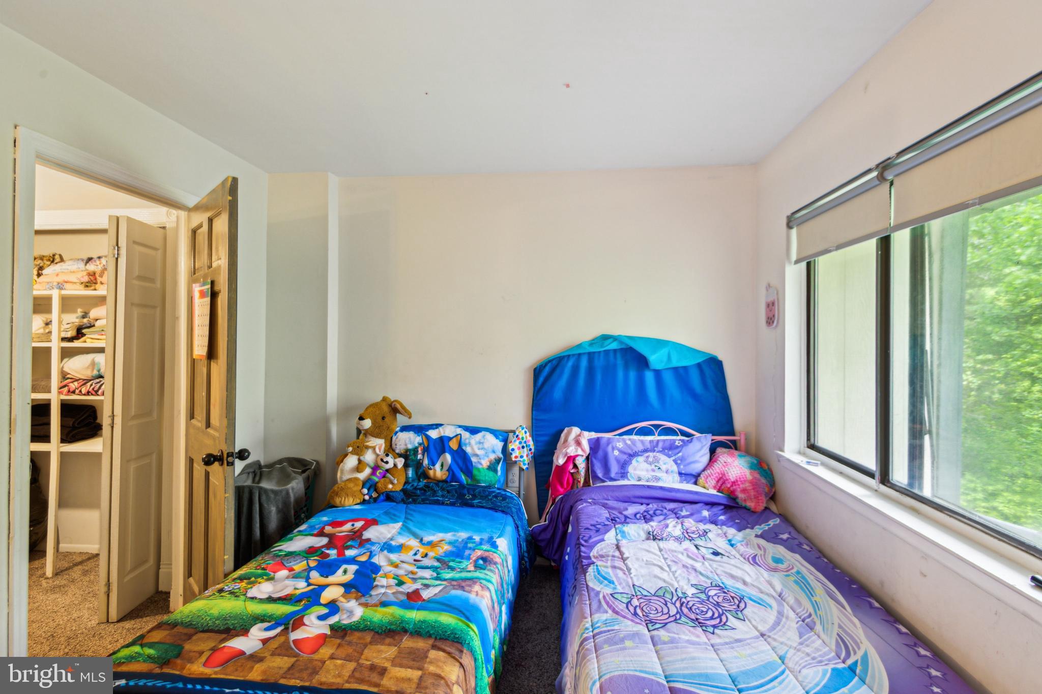 1008 Timber Creek Road Clementon, NJ 08021 - Photo 12 of 24 a bedroom with a bed and a window