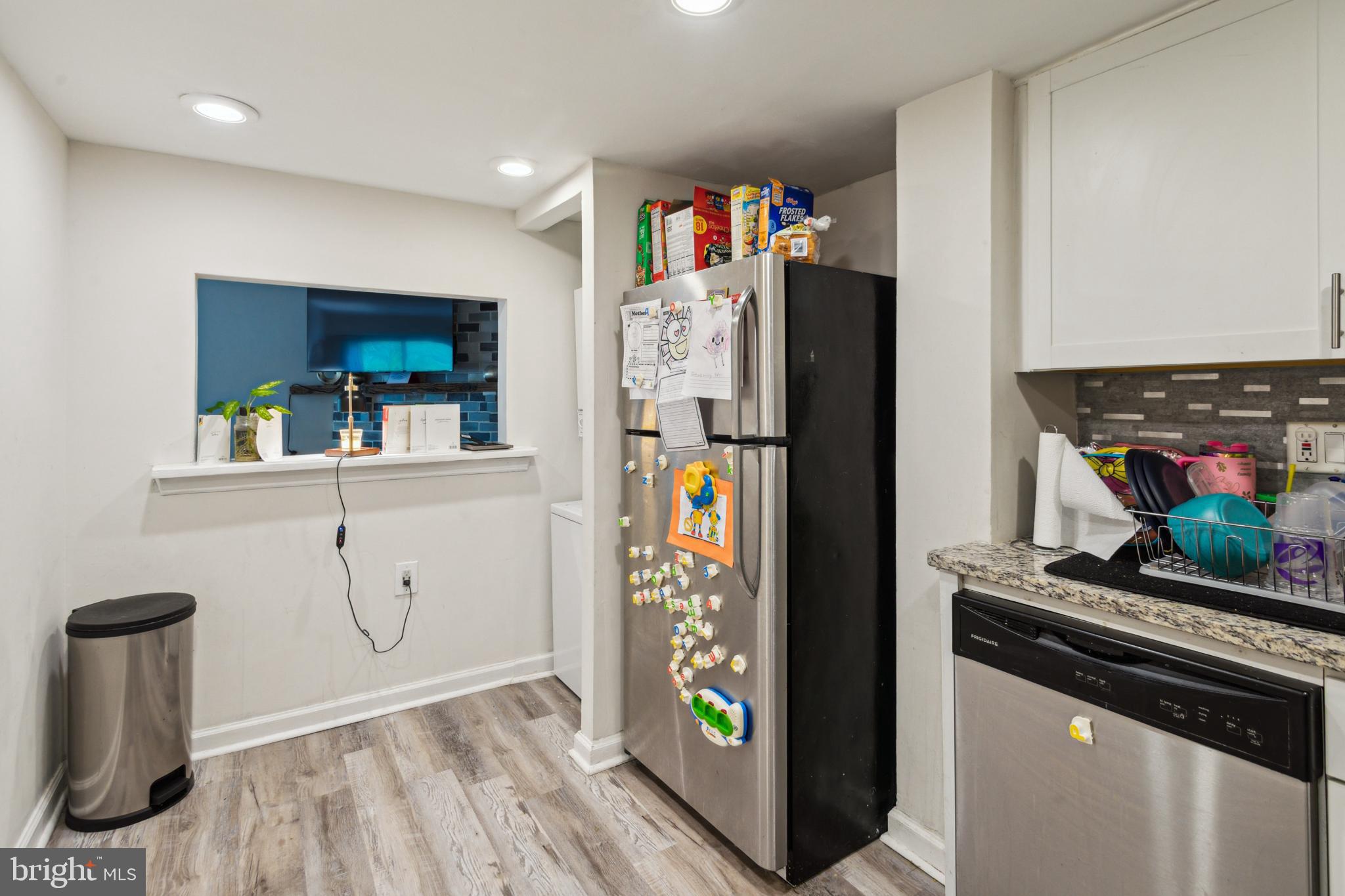 1008 Timber Creek Road Clementon, NJ 08021 - Photo 23 of 24 a view of kitchen with stainless steel appliances cabinets and a window