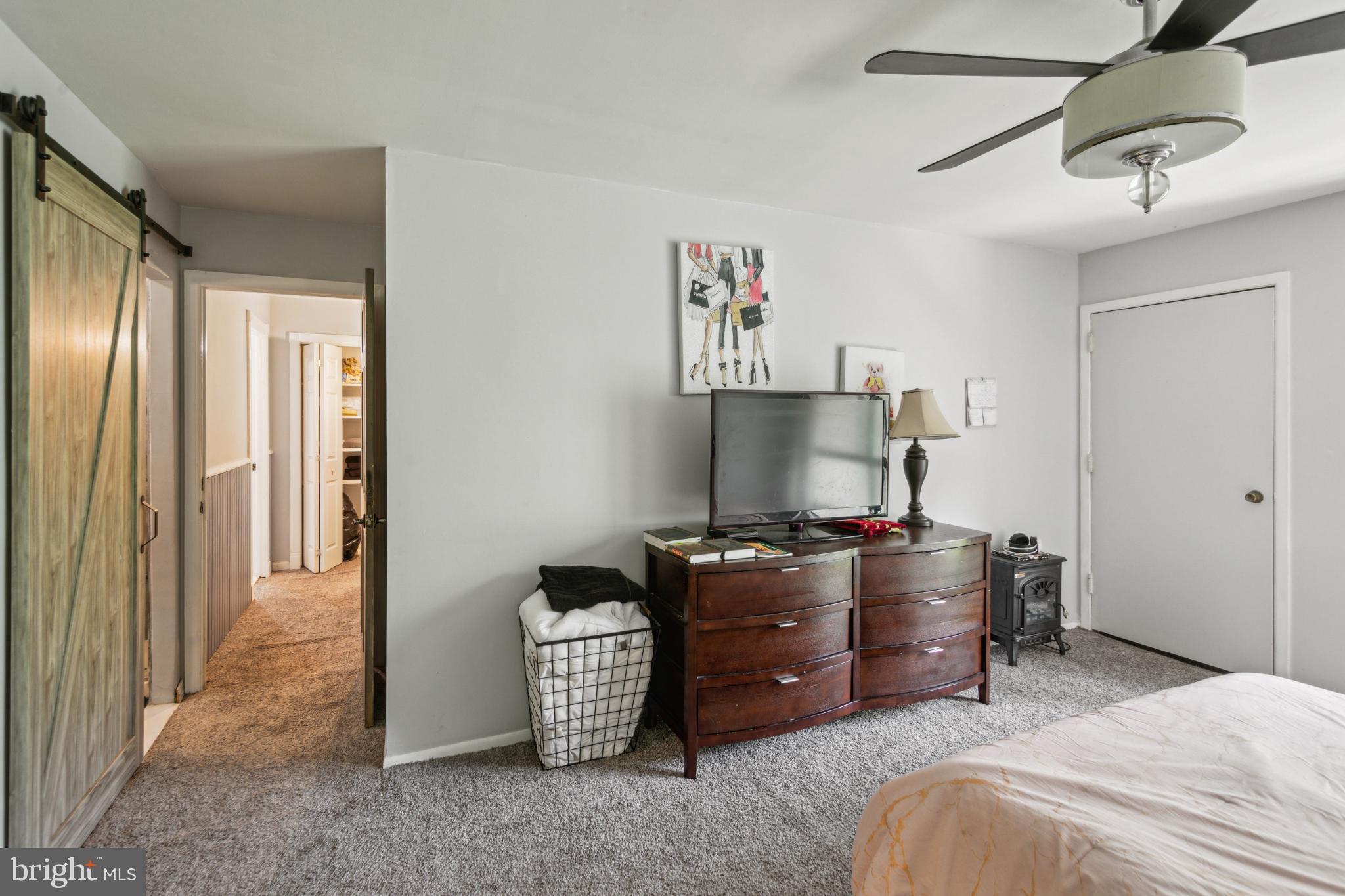 1008 Timber Creek Road Clementon, NJ 08021 - Photo 9 of 24 a bedroom with a bed and a desk