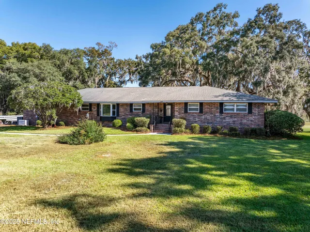 a view of a house with a swimming pool