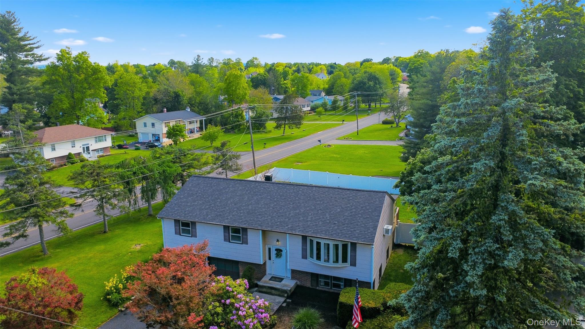 24 Beatty Road Wappingers Falls, NY 12590 - Photo 2 of 36 a view of a house with a yard and garden